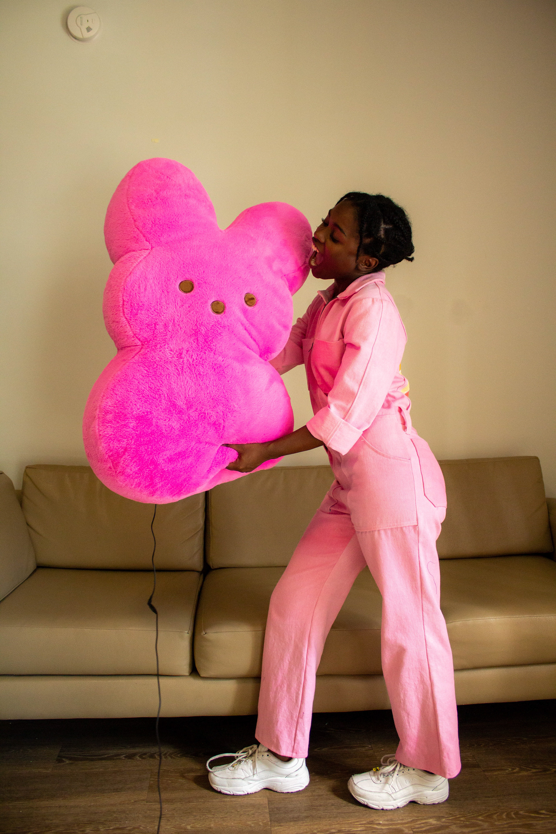 Pink jumpsuit with giant peep!