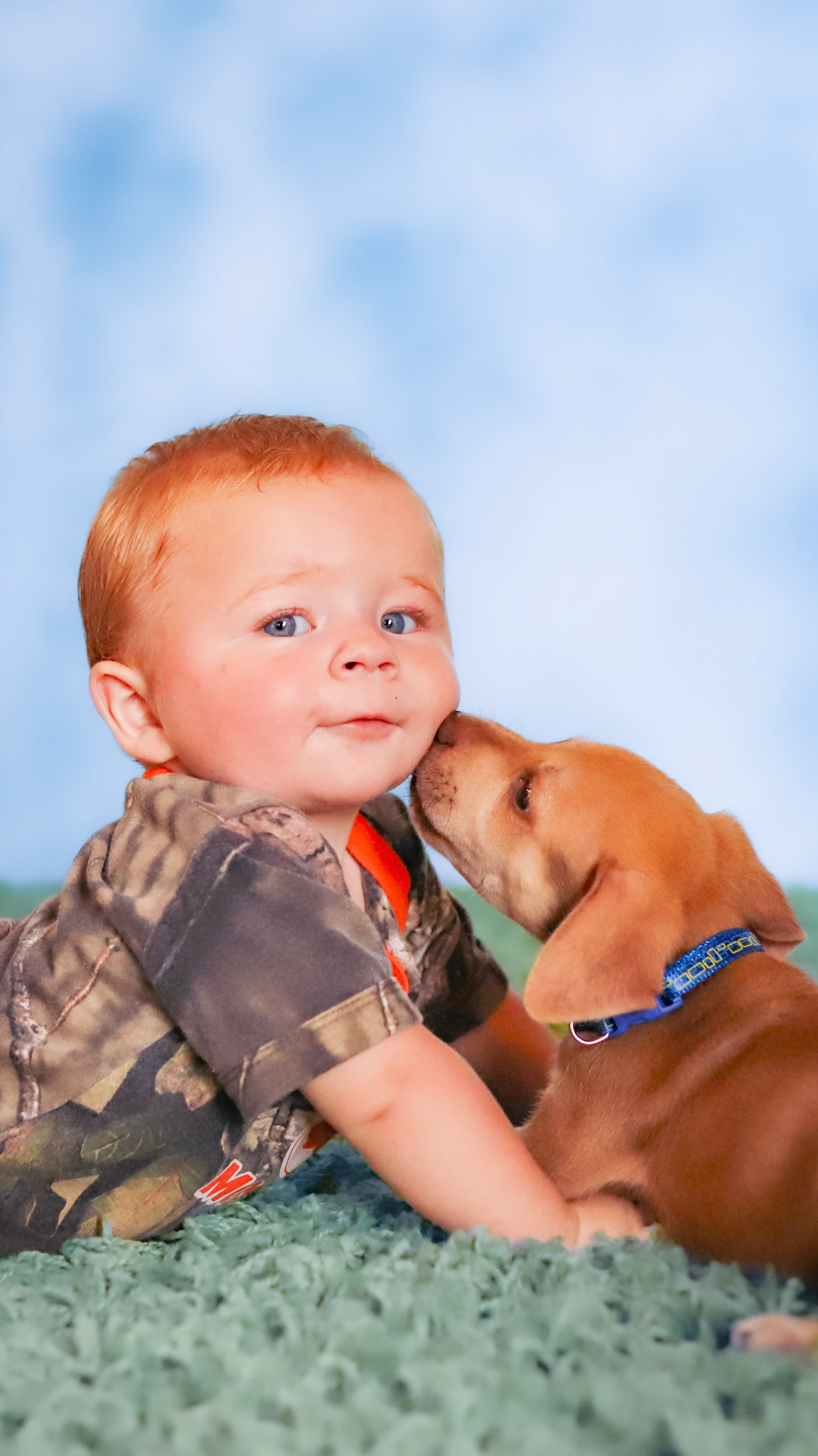 Baby and puppy portrait