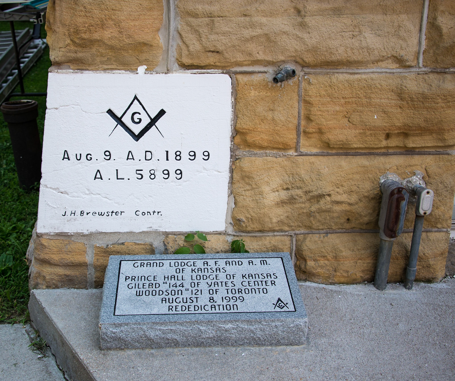 Cornerstone and Rededication stone Yates Center KS