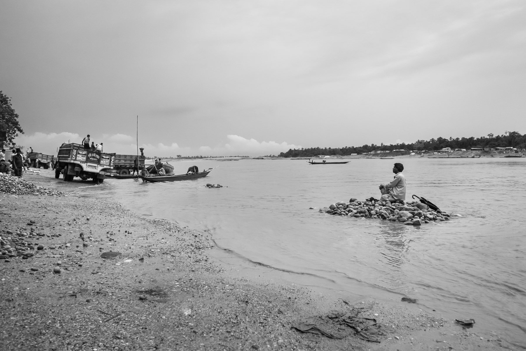 Trucks collecting stones from the Goyain river before bringing them to contruction sites throughout the country, Jaflong, Bangladesh, May 2016