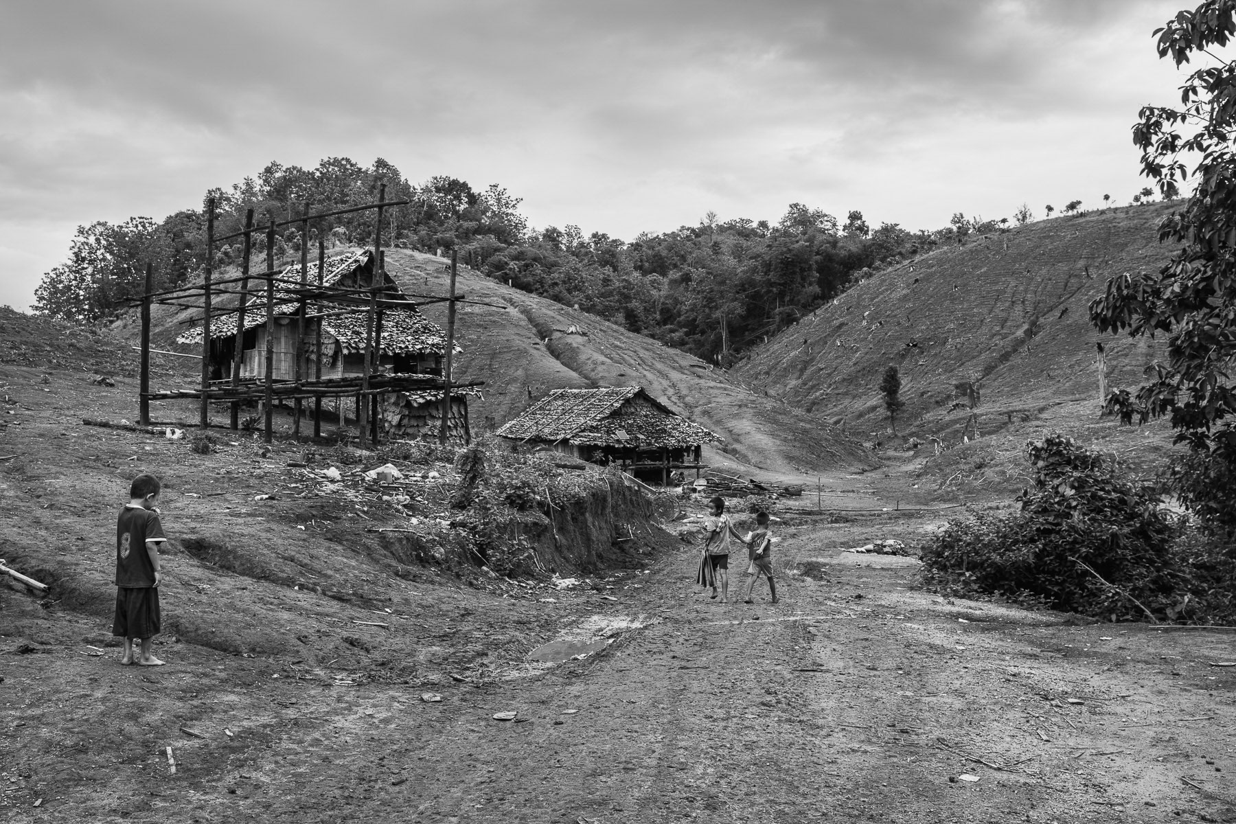 These Karen children, having fled violence, now navigate life in an IDP camp. Kanele, Karen State, Myanmar, 2025