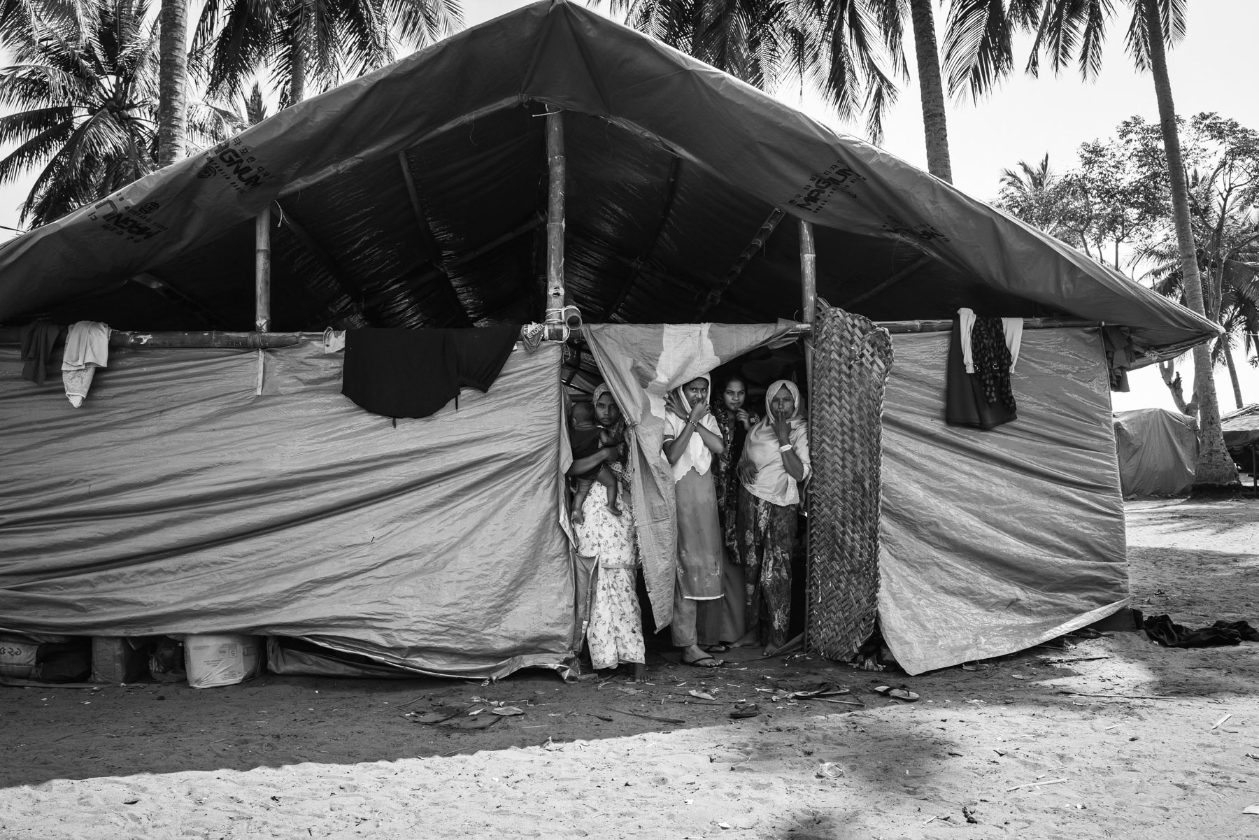 Stranded Rohingya boat people from Burma that have arrived recently on the coast of Aceh. They are sheltered on the beach where arrived 3 months ago. Pidie, Aceh, Indonesia, February 2024