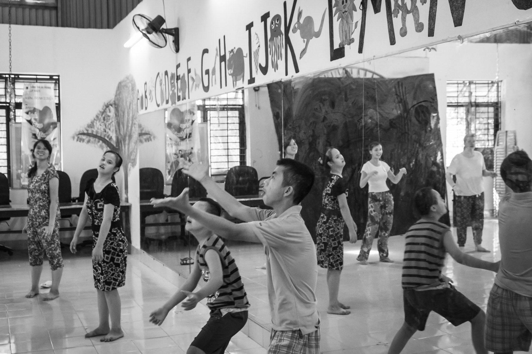 Agent Orange victims playing at the Friendship Village in Hanoi. Agent Orange is a chemical defoilant rich in dioxin that was massively used by the American Army in clearance operations during the Vietnam War. Although its use was stopped in 1971, almost 50 years later desendants of affected victims are still born with mental and/or physical problems due to the toxicity of the dioxin passed on through generations. Hanoi, Vietnam, June 2018