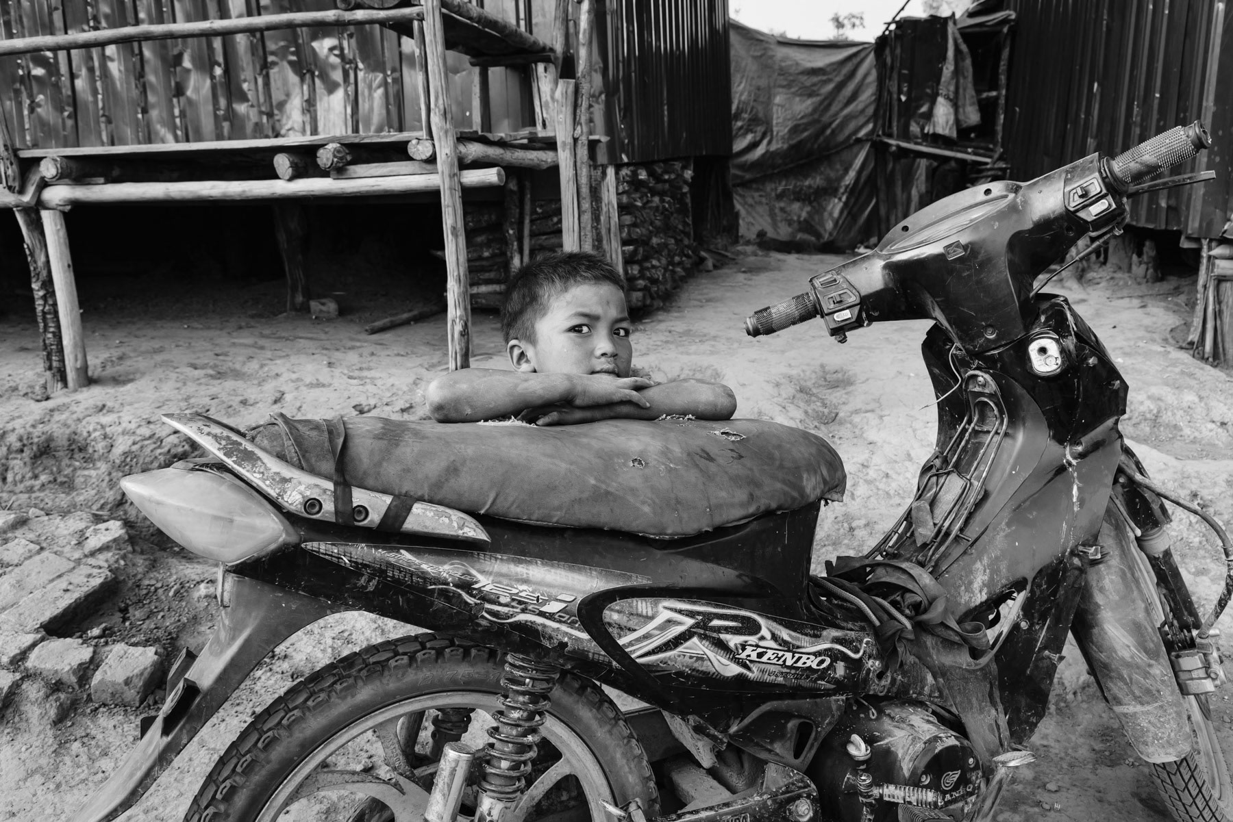 Chin boy living in a camp for internally displaced persons from Chin. Salen IDP camp, Thantlang township, Myanmar, April 2024