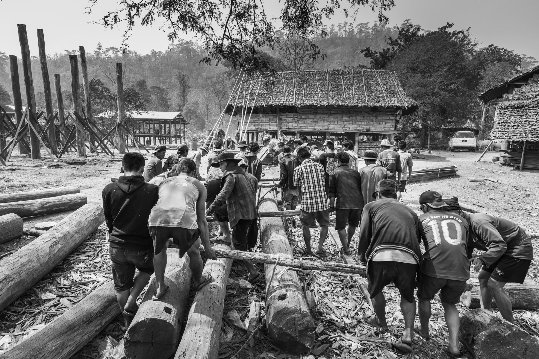 Karen villagers building a house with local timber. Taotah village in Kayin State, Myanmar, March 2019