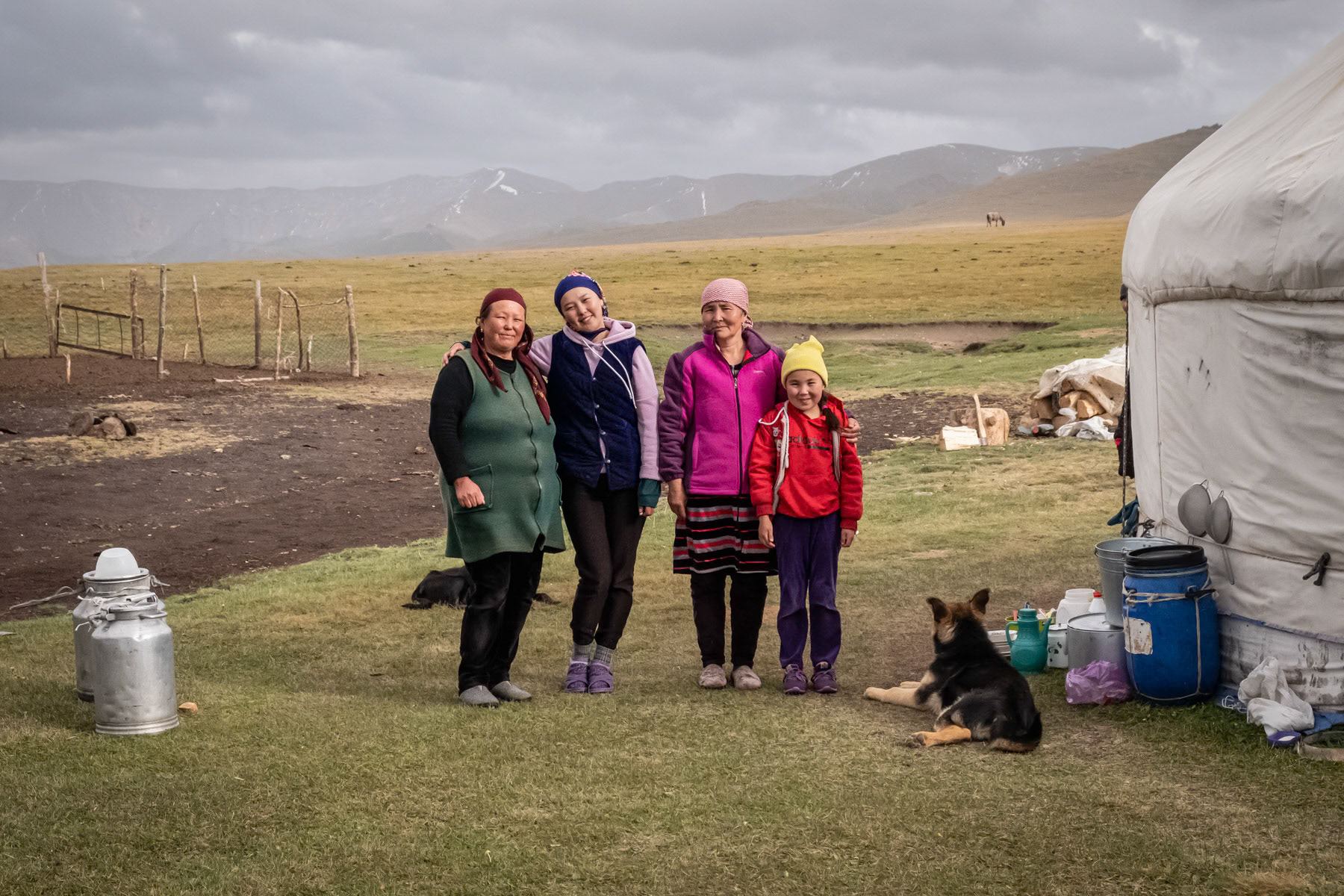 Women take care of all household activities and collect milk several times a day from the horses and cows. Entire families will live for up to 3 months in their yurt camp high up in the mountains in search of green pastures. Son Kul Lake, Naryn region, Kyrgyzstan, August 2021