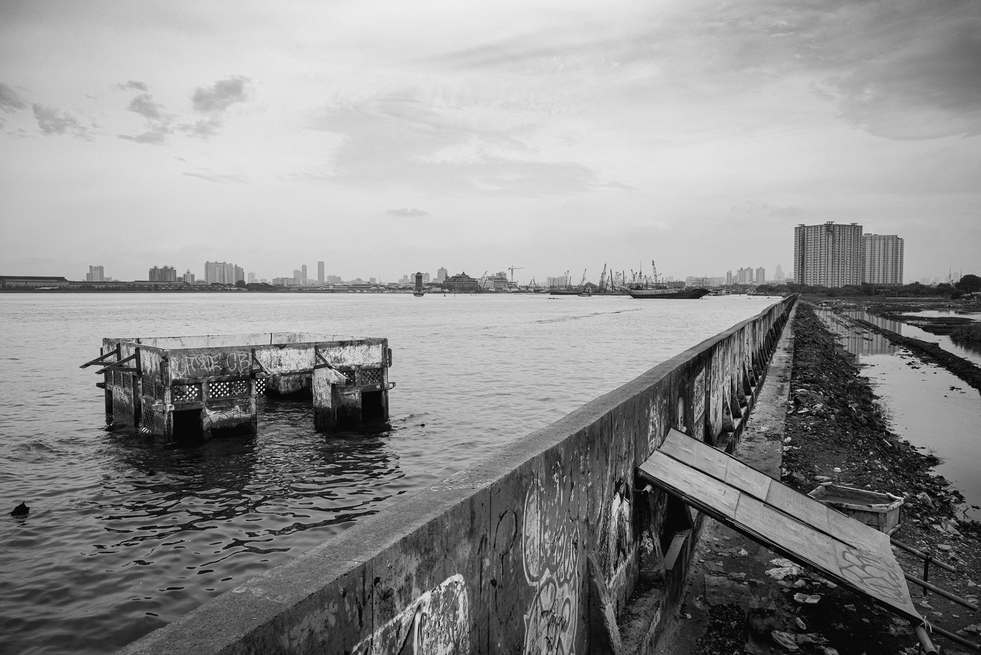 A half sunken mosque, a haunting monument to a city beneath the waves. Muara Baru, Jakarta, January 2026