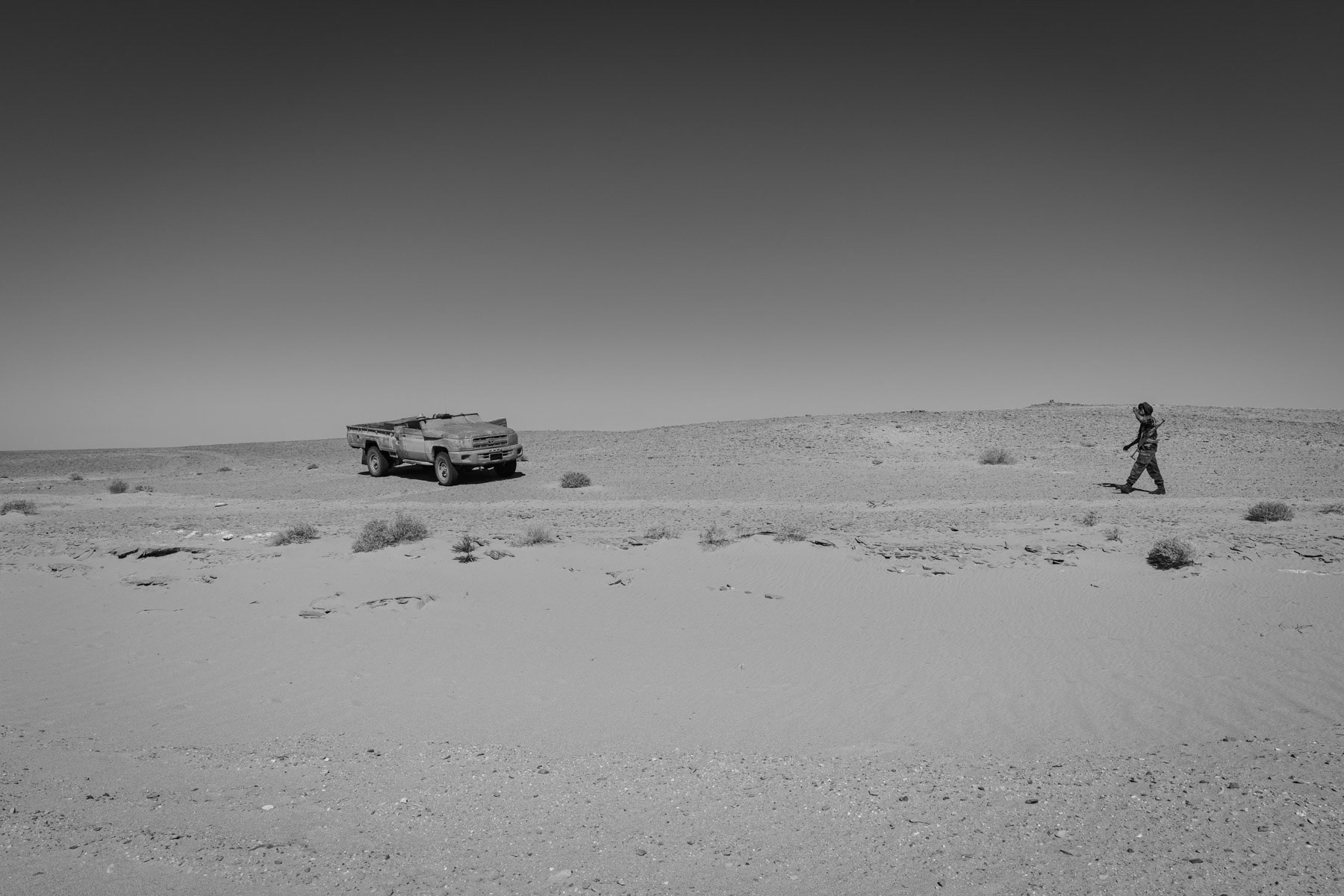 Sahrawi soldiers preparing to move towards frontline positions near 2,700 km long sand wall, built by Morocco, dividing the Western Sahara between the Moroccan controlled territories and Sahrawi liberated territories. Undisclosed location behind the frontline in the liberated Sahrawi territories, Sahrawi Arab Democratic Republic, October 2021
