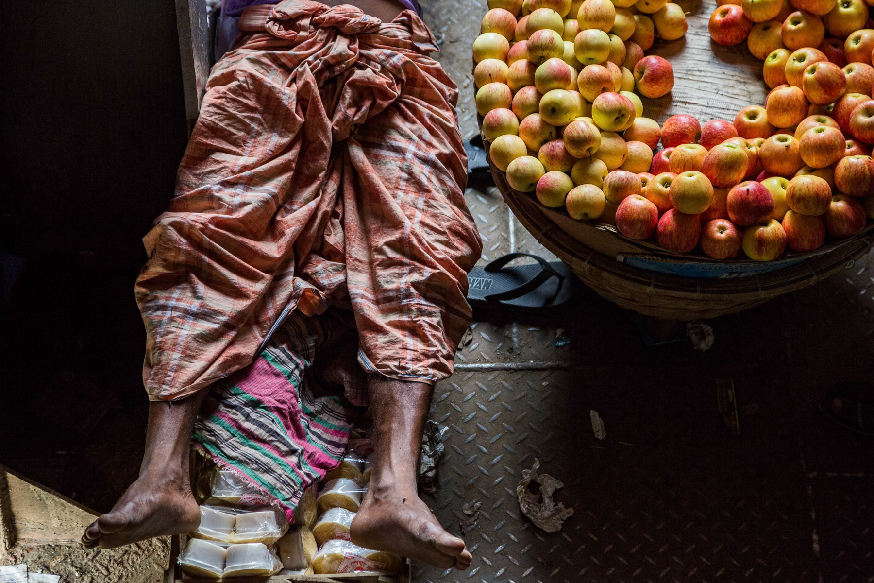 Fruit seller on a ferry crossing the Jumuna river, Bangladesh, April 2014
