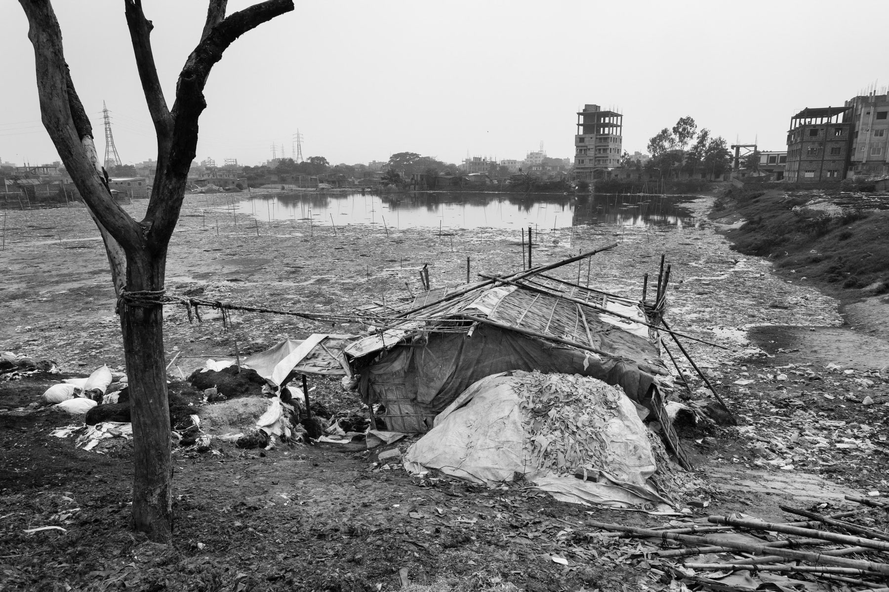 Tanneries dump daily an estimated twenty thousand cubic liters of toxic waste water containing cancer-causing hexavalent chromium into the Buriganga, Dhaka's main river and water supply. Residents of Hazaribagh, where tanneries are located, live next to contaminated canals, streams and ponds. Hazaribagh, Bangladesh, October 2014
