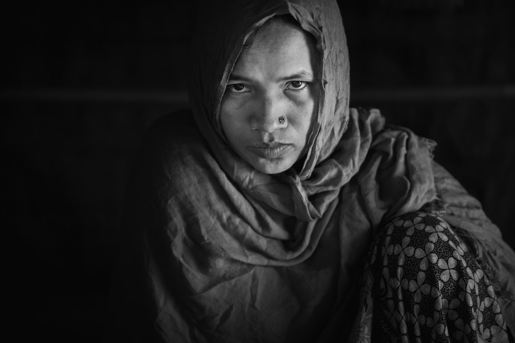Hasina, 37, a Rohingya refugee from a village near Maungdaw in Myanmar. Her village was attacked by the Myanmar military during the first so called security operations in October 2016. During the attack her husband and two sons of 9 and 13 years were massacred. She arrived with her 4 surviving children in Bangladesh in October 2016. Rohingya refugee camp Kutupalong section II, Cox's Bazar, Bangladesh, October 2018