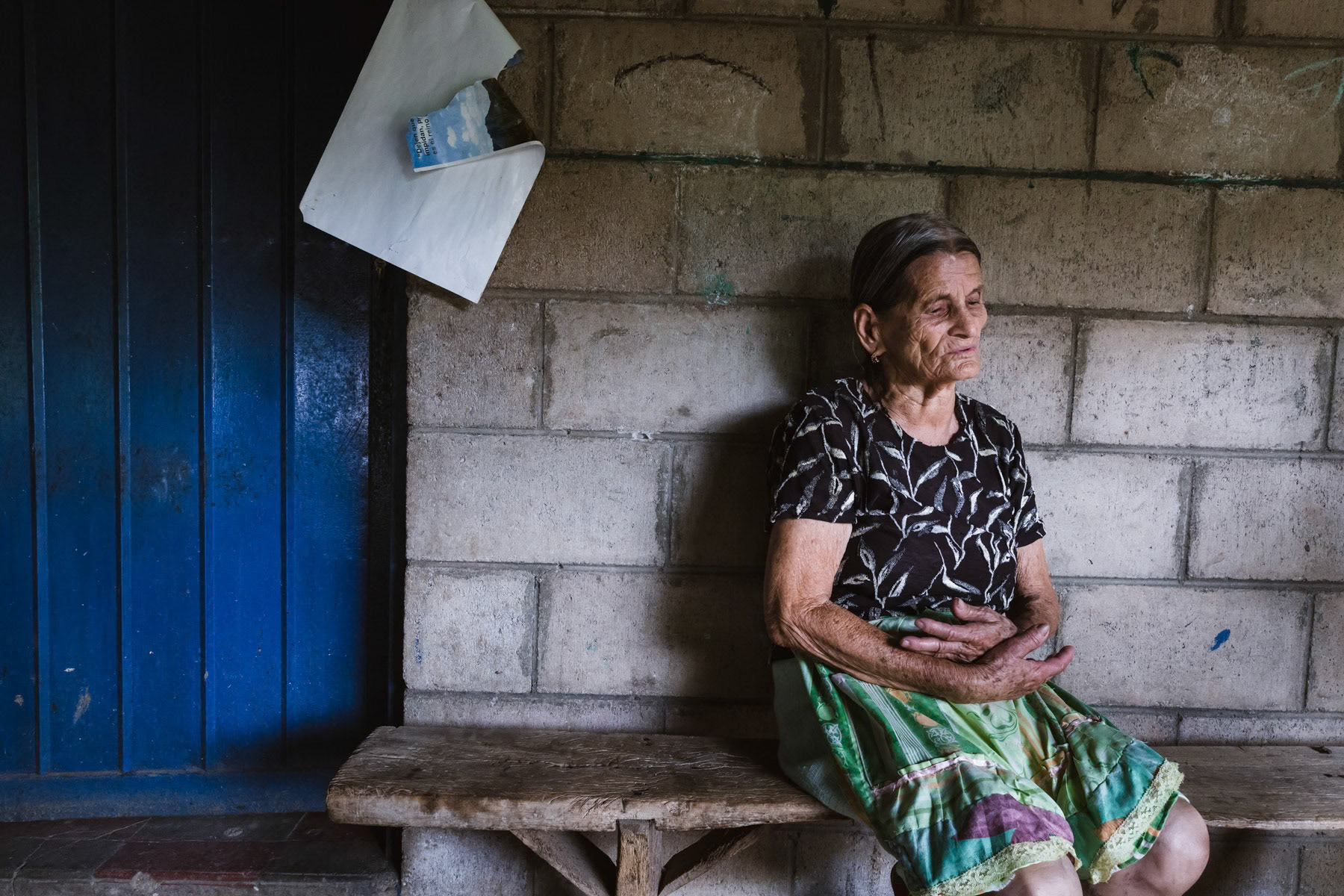 Maria Marchiana Echeverria, 83 years, had to flee in the mountains when the region was attacked by right-wing military dead squads in 1980. She fled because she was accused of being part of the guerilla, her husband and 5 boys were assasinated by the military. She managed to escape in the mountains with her 3 surviving daughters were she will stay for 12 years before returning to Arcatao. During the first 3 months her children were about to die because the lack of food, water and shelter. Hardly able to survive she gave 2 of her daughters (Justa and Carolina) to a religious organisation that put them for adoption in Guatemala. She traced them only 22 years after the war had ended in 2014. When returning to Arcatao in 1991, the village was completely destroyed, villagers were still being tortured by the military, where most torture and killings of suspected guerrilla's took place in the church. Even children would be tortured to denounce gueriilla members. The perpetrators of the massacres and war crimes in Arcatao and the wider region have never been put on trial to date. Arcatao, El Salvador, April 2019
