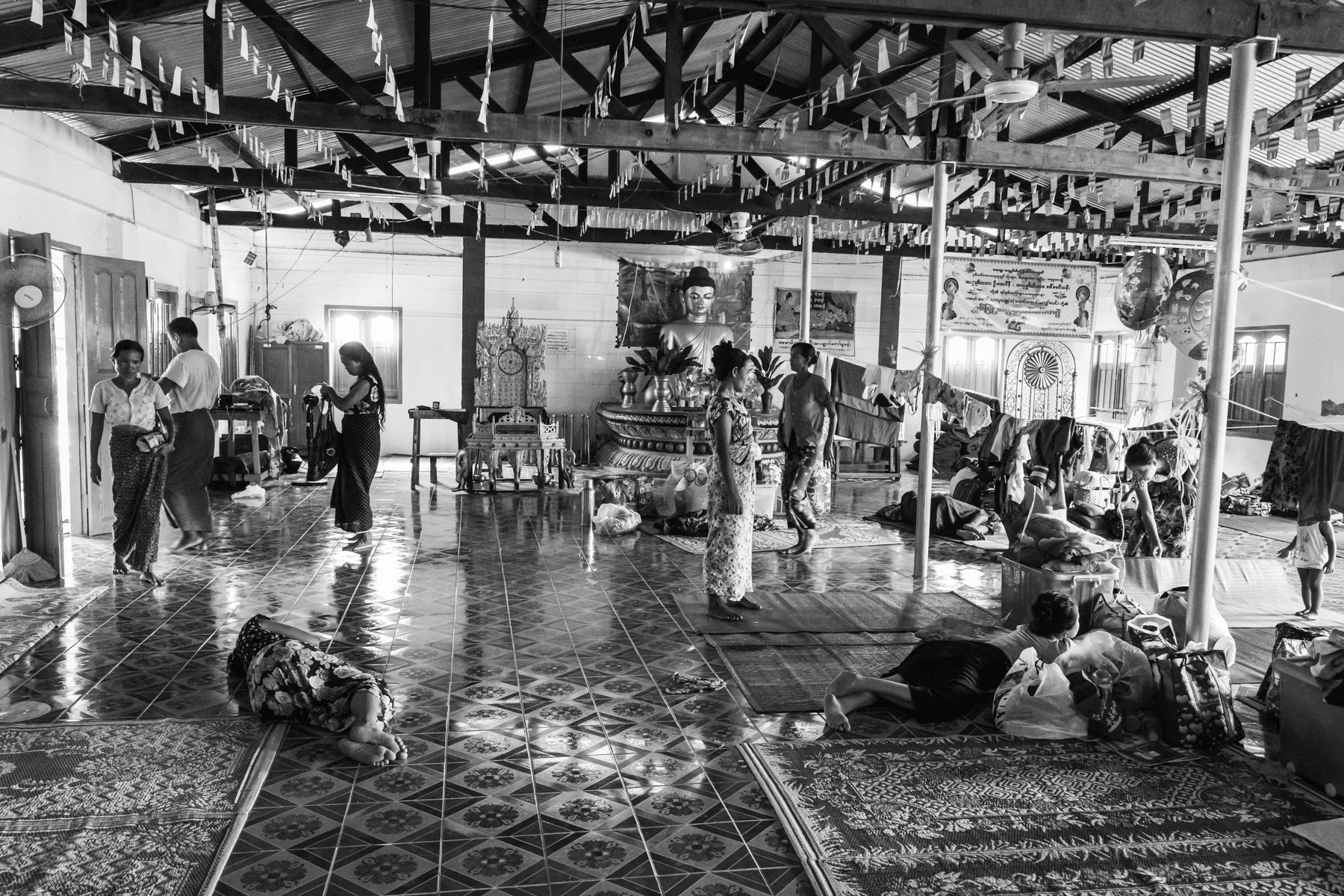 Arakanese IDP displaced from villages in Buthidaung township where regular combat occures between the Arakan Army (AA) and government troops. Over 40,000 people have been forced to flee since beginning 2019 and are now surviving in a very precarious situation. Da Ma Re Monastery is used to host 200 displaced persons since April 2019. Sittwe, Rakhine State, Myanmar, October 2019