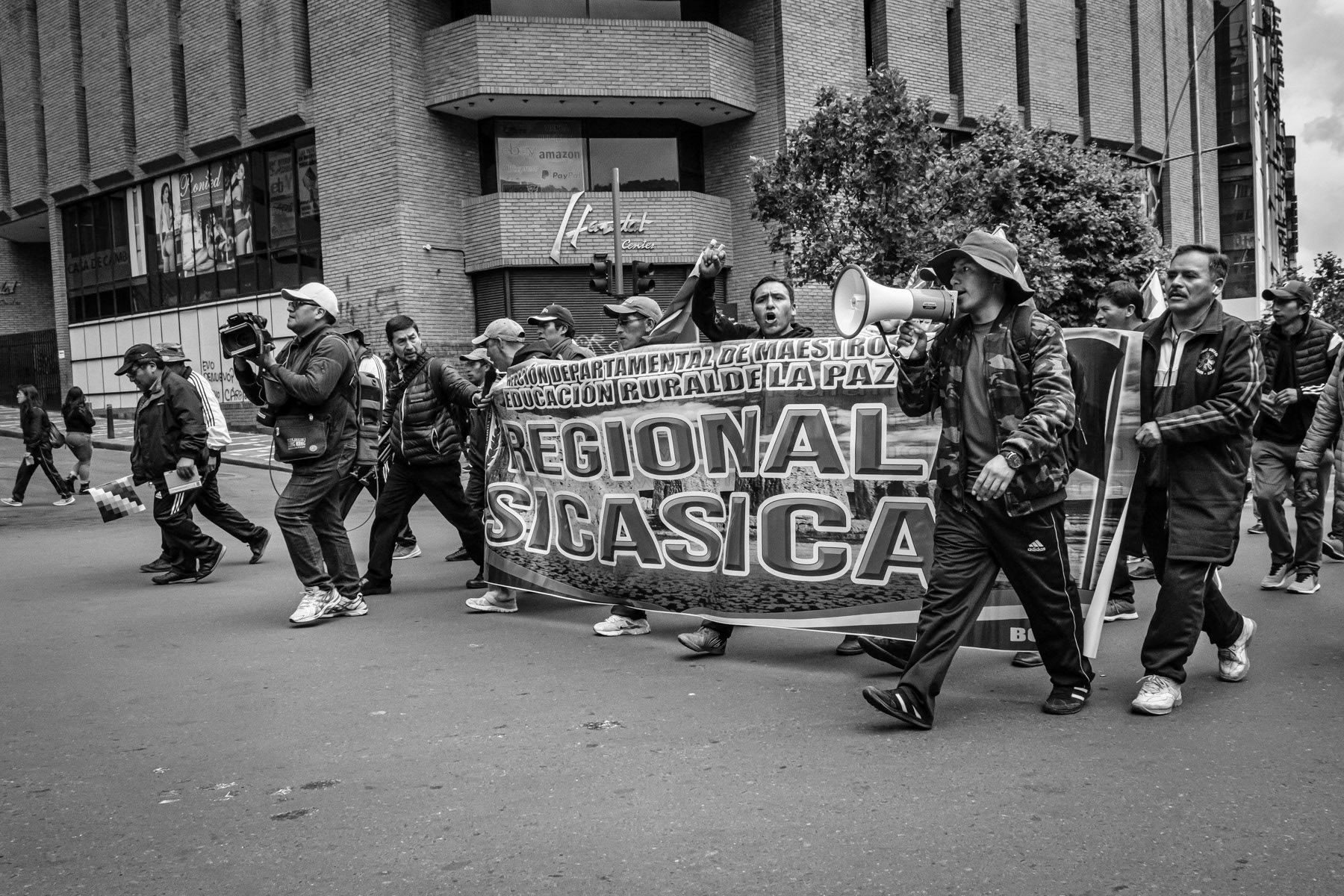 Civil protests following the presidential election results of October 2019, alleged electoral fraud and finally the military command's request for President Evo Morales to resign pushed the country for a couple of days in a power vacuum marred with violent confrontation. Evo Morales fled the country and accepted asylum in Mexico whereas the second vice-president of the Senate assumed the role of President. With the opposition firmly in control of the Presidency, new elections have 6 months later still not been held. Pro-Morales demonstrators in downtown La Paz. The elected President, Evo Morales, fled the country after losing support from the military. A conservative government has taken control by appointing the speaker of the Senate as interim President of the country. La Paz, Bolivia, November 2019