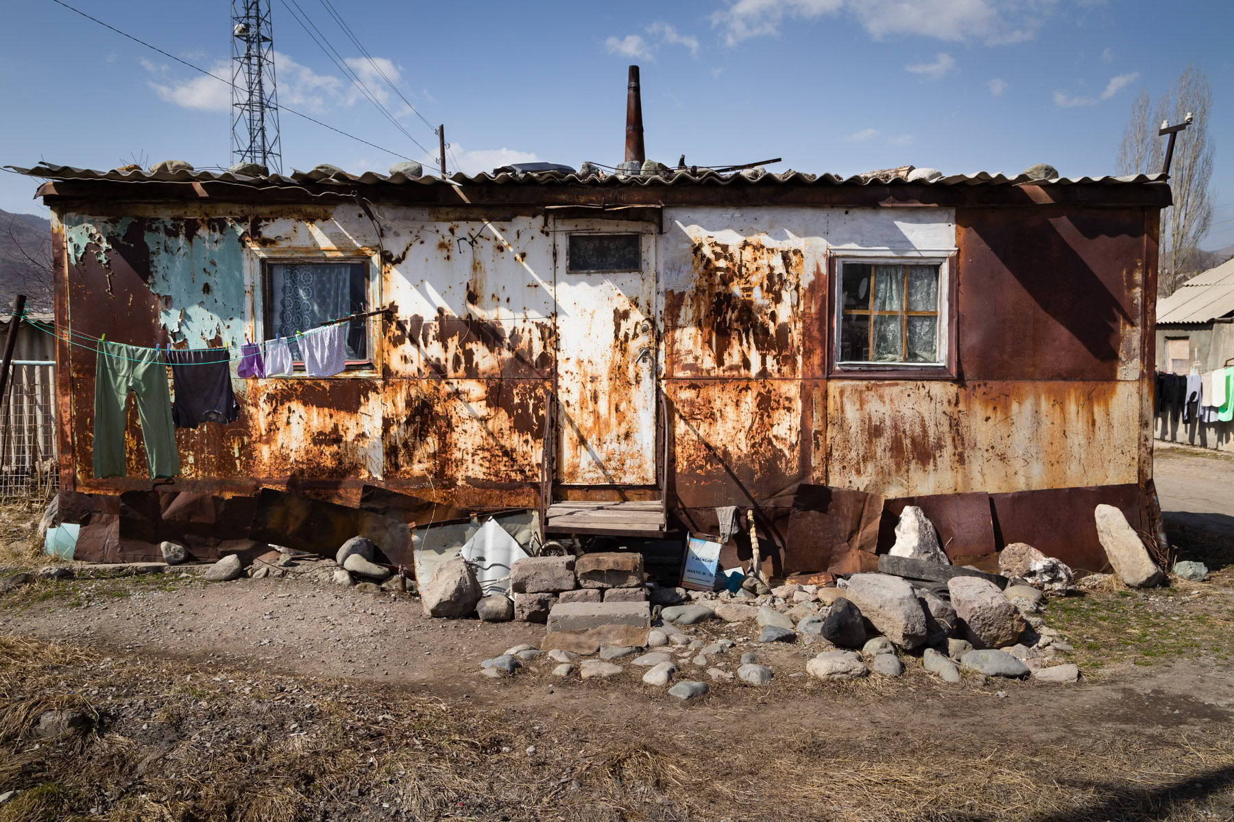 A domik or metal container ,set up in the aftermath of the terrible 1988 earthquake that struck the region. Domik settlement of Vanadzor, Armenia, March 2014