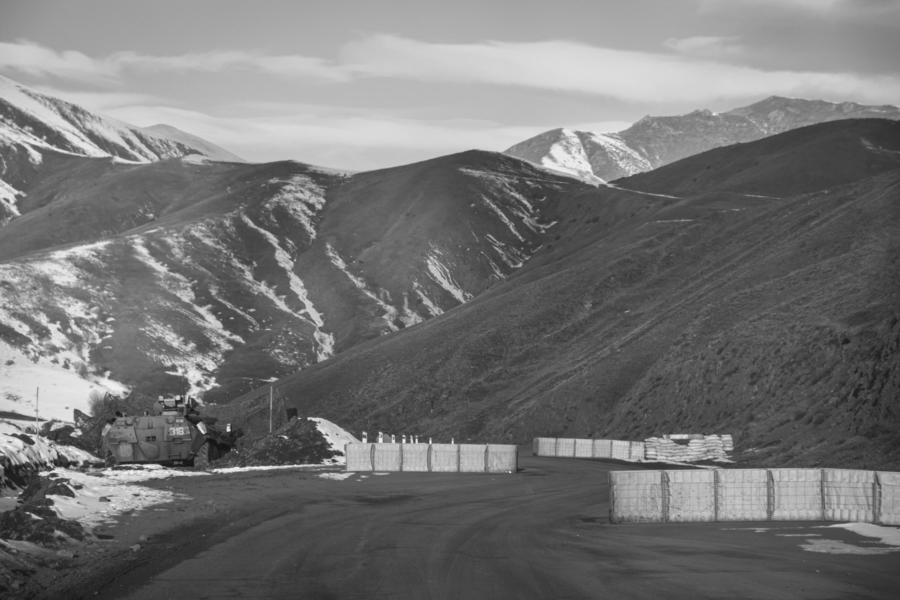A Russian checkpoint along the Lachin corridor linking Stepanakert and Goris in Armenia. The corridor is under Russian peace keeping forces's control altough passing through Azerbaijan after territories surrounding Karabakh were handed over by Armenia to Azerbaijan in accordance with the ceasefire agreement signed on 10 November 2020 between Russia, Azerbaijan and Armenia. Nagorno-Karabakh, December 2020