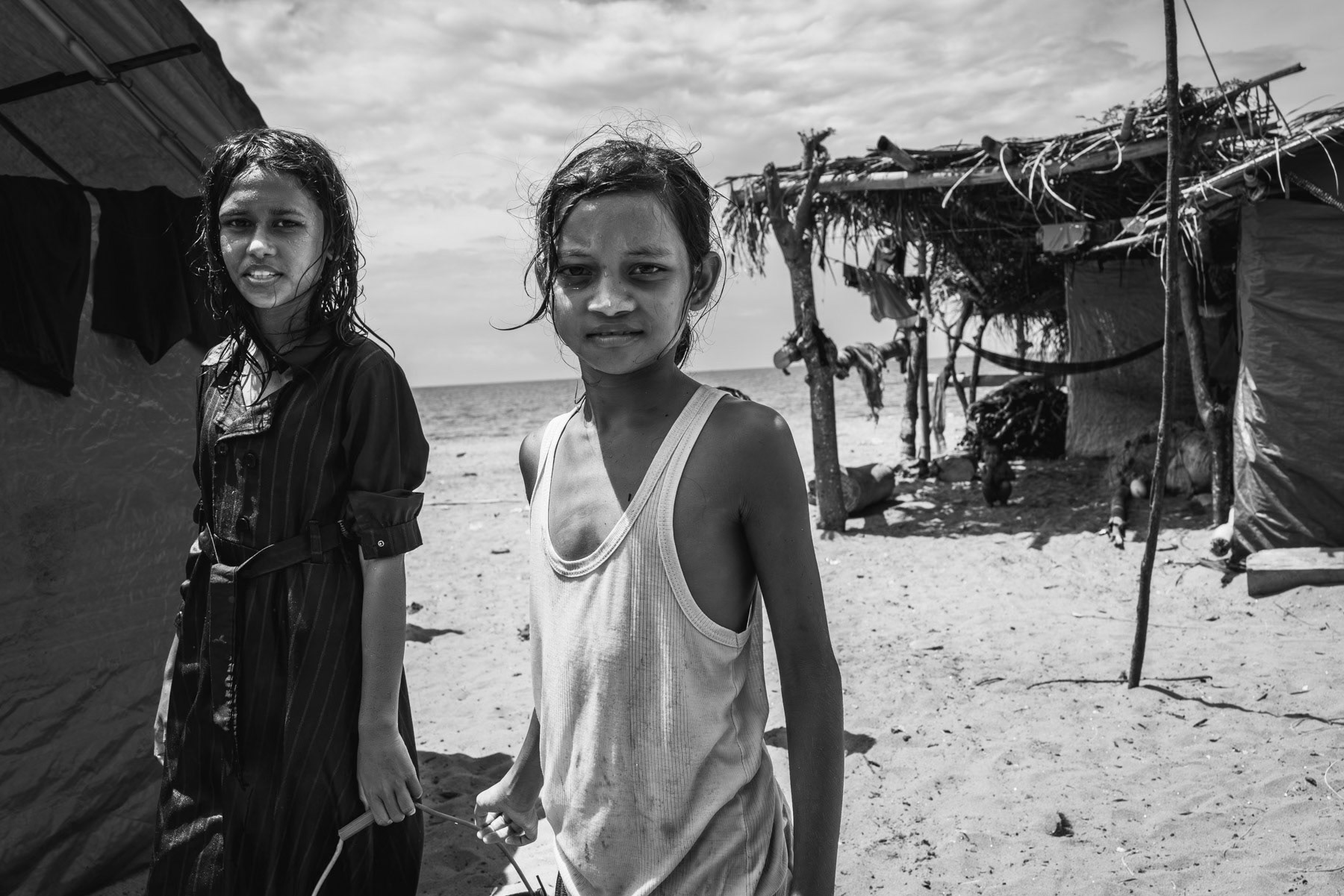 Stranded Rohingya children from Burma that have arrived recently on the coast of Aceh. They have been sheltered on the beach under harsh conditions ever since setting foot on this beach 6 months ago. Kulee Pidie in Aceh on the island of Sumatra in Indonesia, May 2024