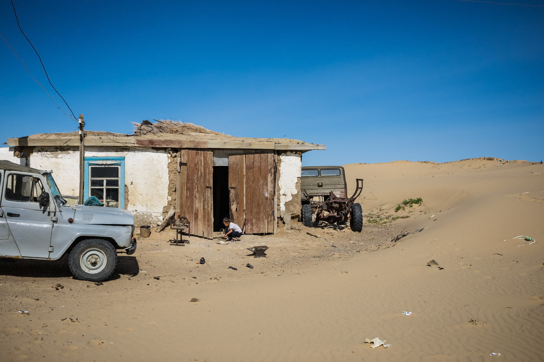 A village slowly overtaken by the desert. Akispey village used to be an important village along the shore of the Aral Sea but is now almost one hour drive to the closest access point. Aral Sea, Kazakhstan, June 2019