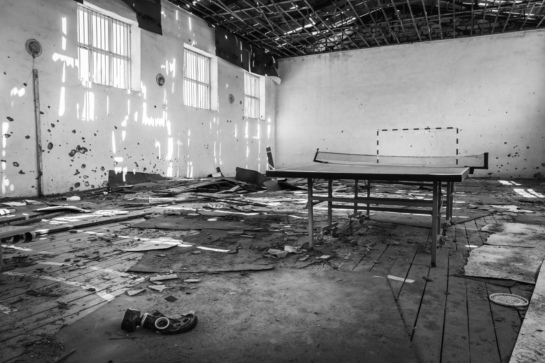 Abandonned school sporthall as the Armenian population fled the Azeri attack on the village during the April 2016 offensive. The school is heavily damaged as it is still today in direct line of fire. Talish school, Nagorno-Karabakh, August 2016