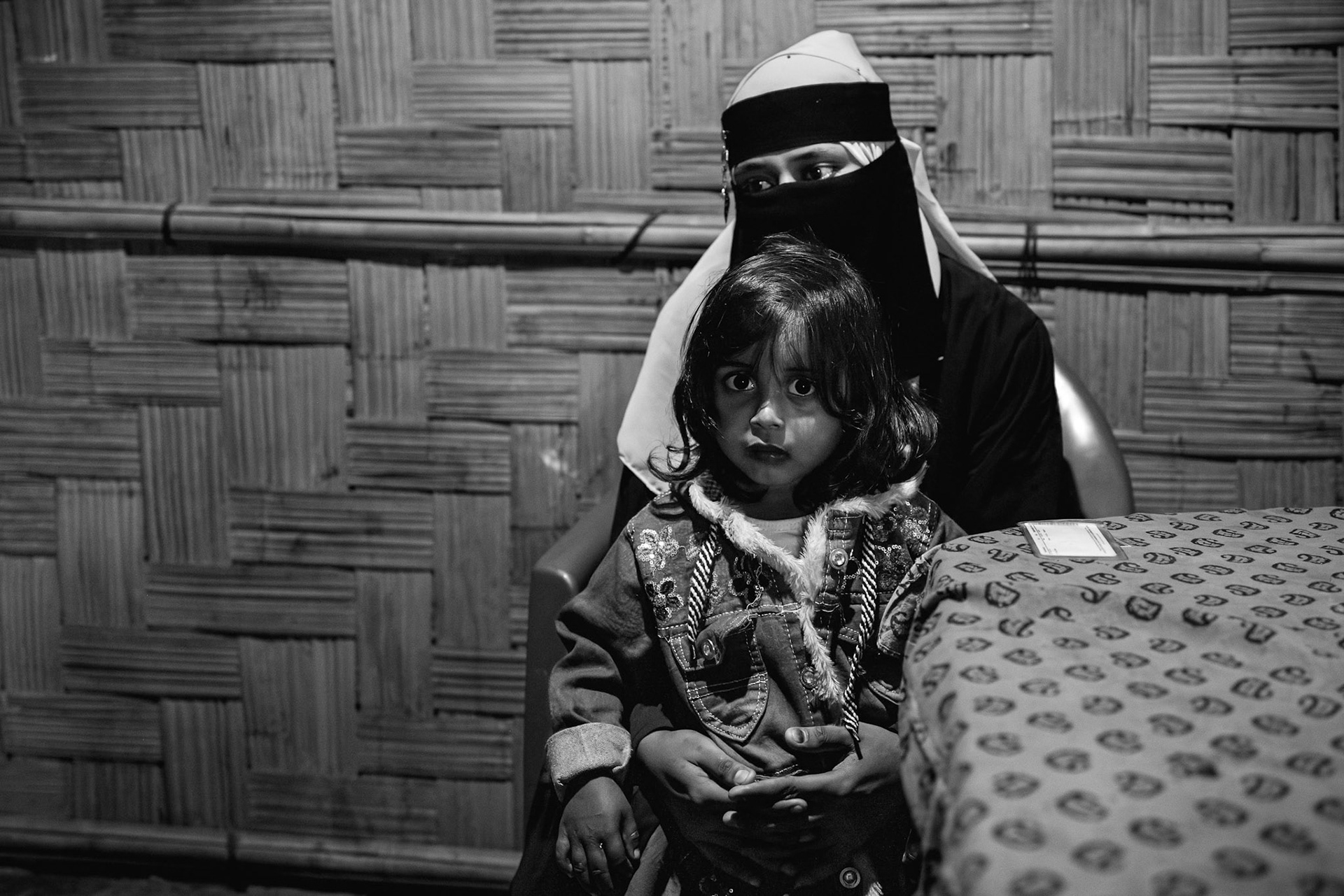 Samira Bibi, 20, with her 3.5-year-old daughter, from Ward 1, Maungdaw, Myanmar; her husband, 25, and one-month-old daughter were killed in an Arakan Army drone strike on their home in August 2024; Balukhali refugee camp, Bangladesh, January 2026