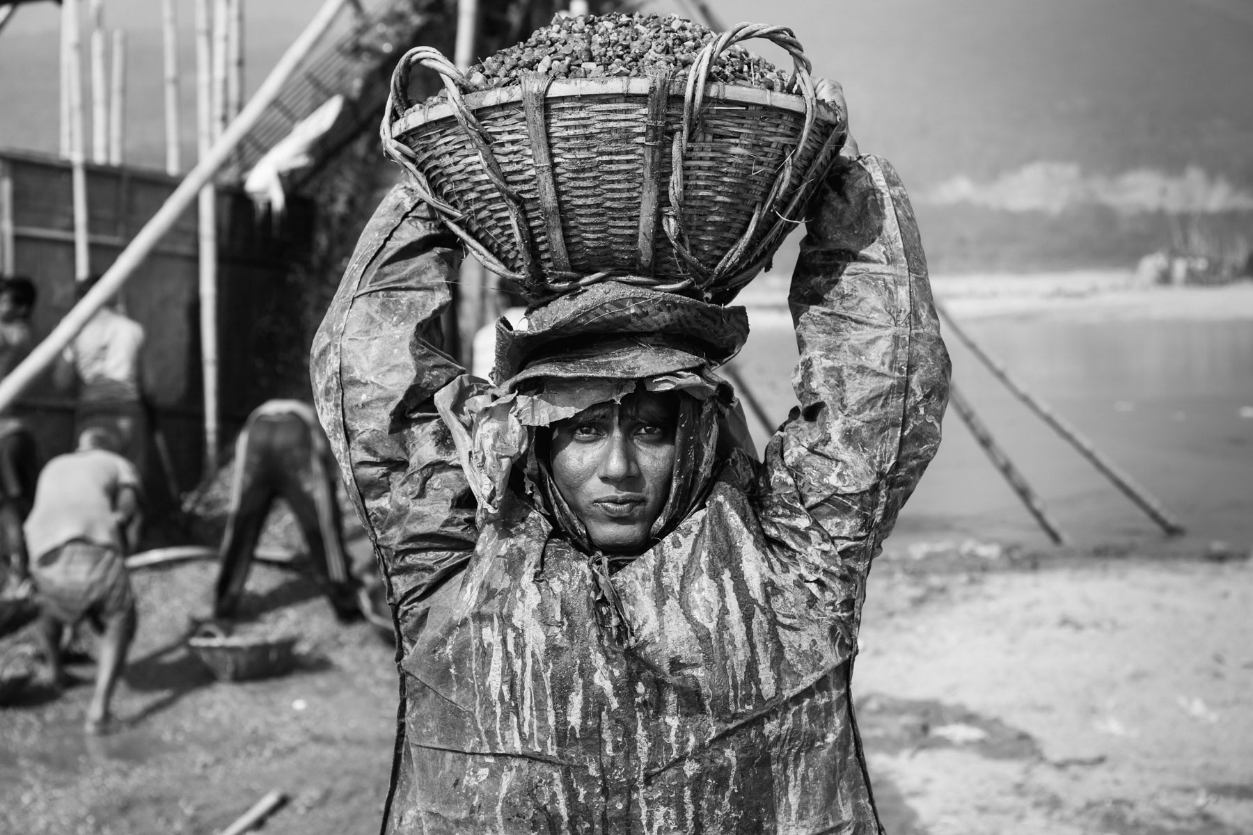 Stone carriers, Bholaganj along the Dholai river in Northern Bangladesh, December 2015