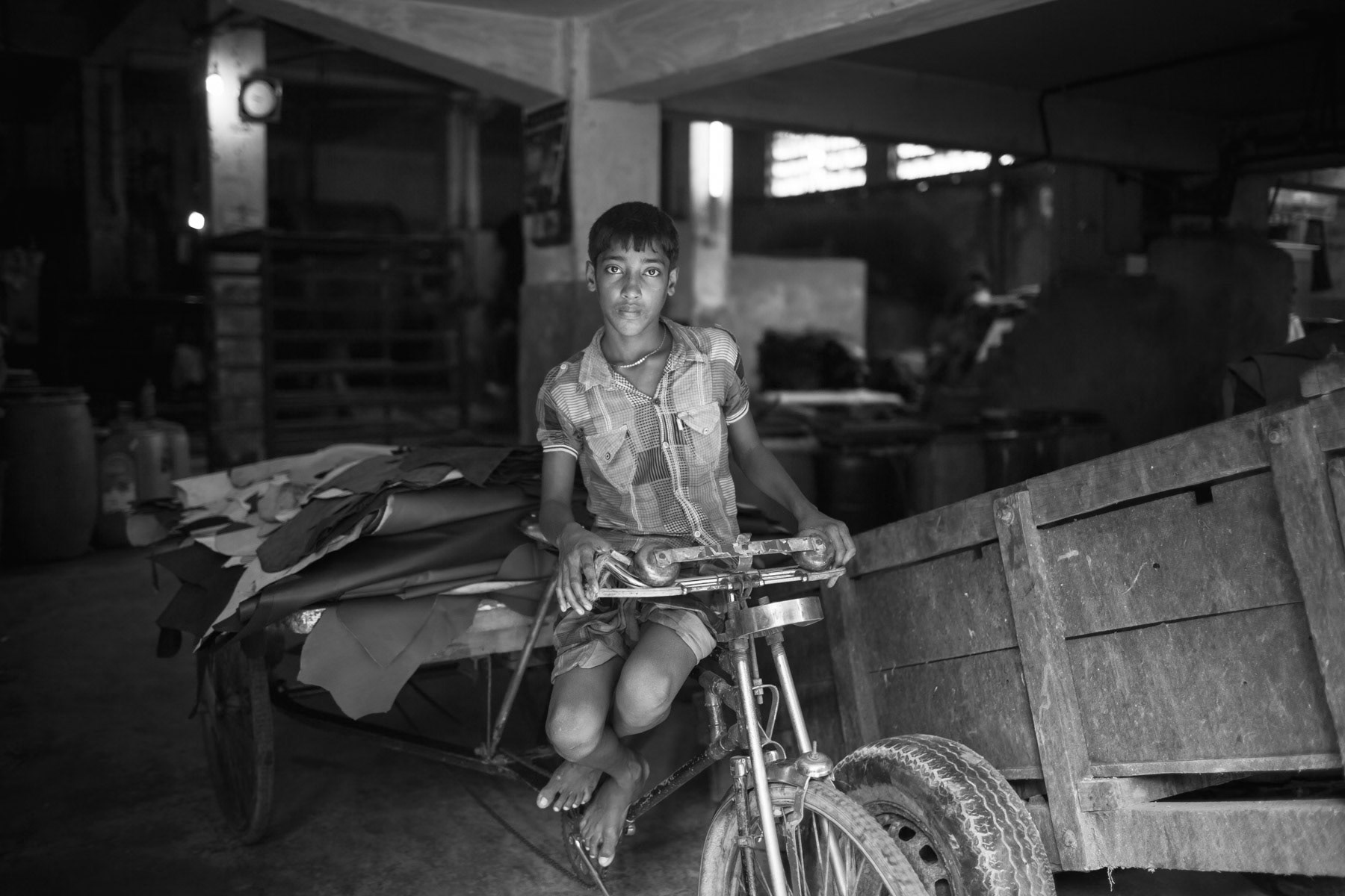 Rickshaw puller, leather production plant in Hazaribagh, Dhaka, October 2014