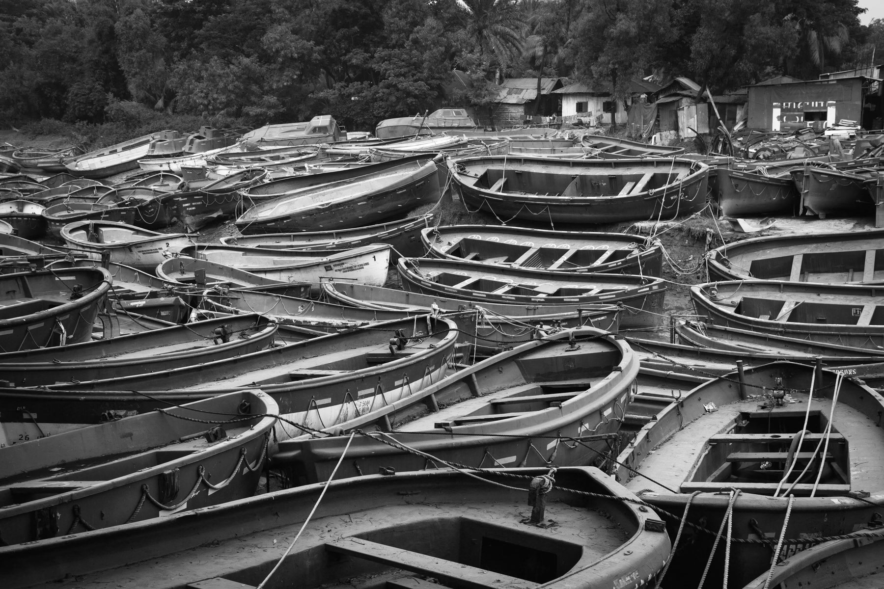 Dismantled life rafts on sale that will be used for local transportation and as fishing boats. Chittagong, Bangladesh, October 2014