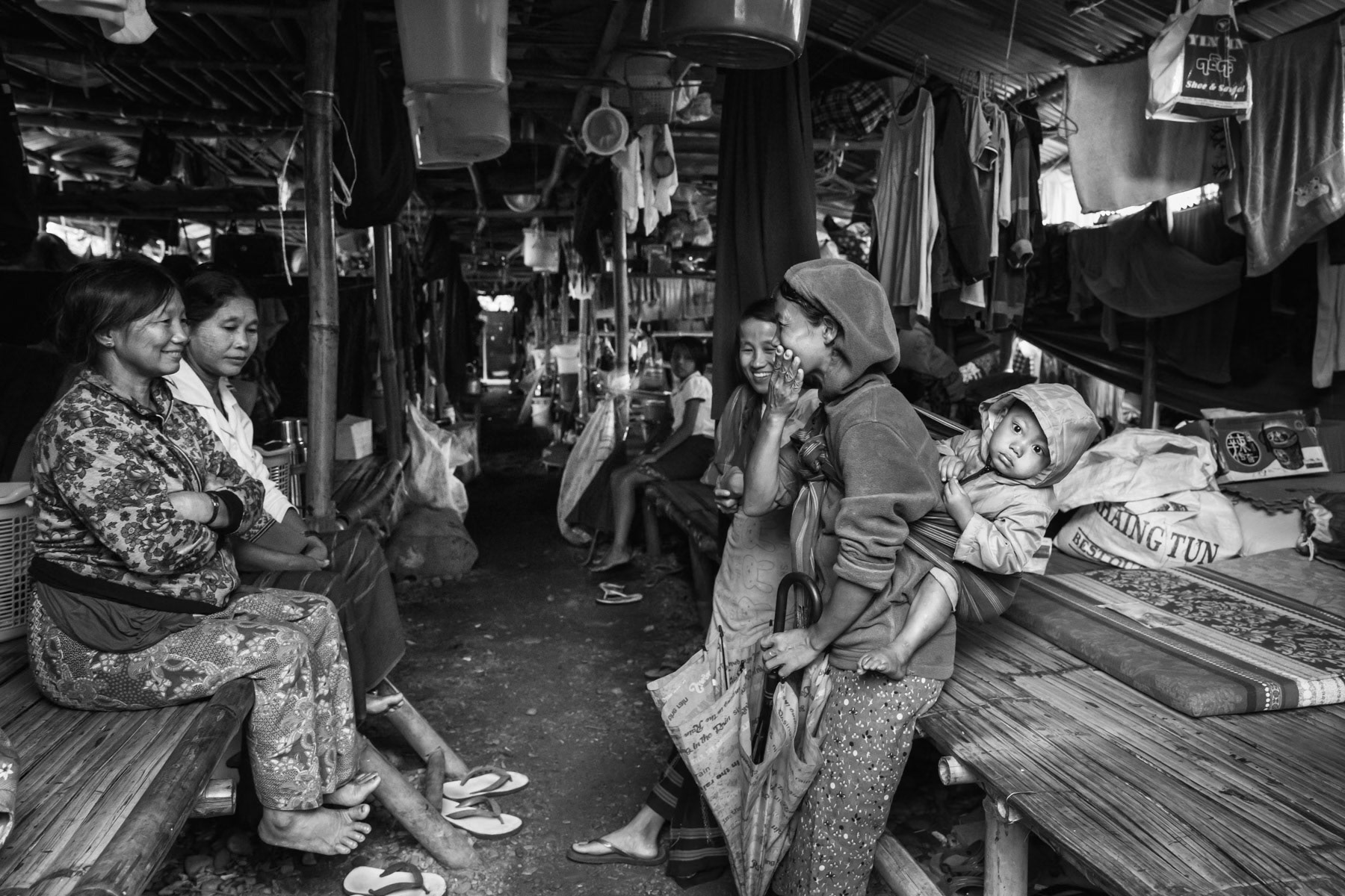 Kachin internal displaced persons living among 400 people on a very small piece of land since 2018 when they fled their village only 25 Km away. Over 100,000 Kachin are displaced within the Kachin State since the armed conflict resumed in 2011 between the Myanmar military and the Kachin Independence Army (KIA). St-Paul IDP camp, Namta, Myanmar, September 2019
