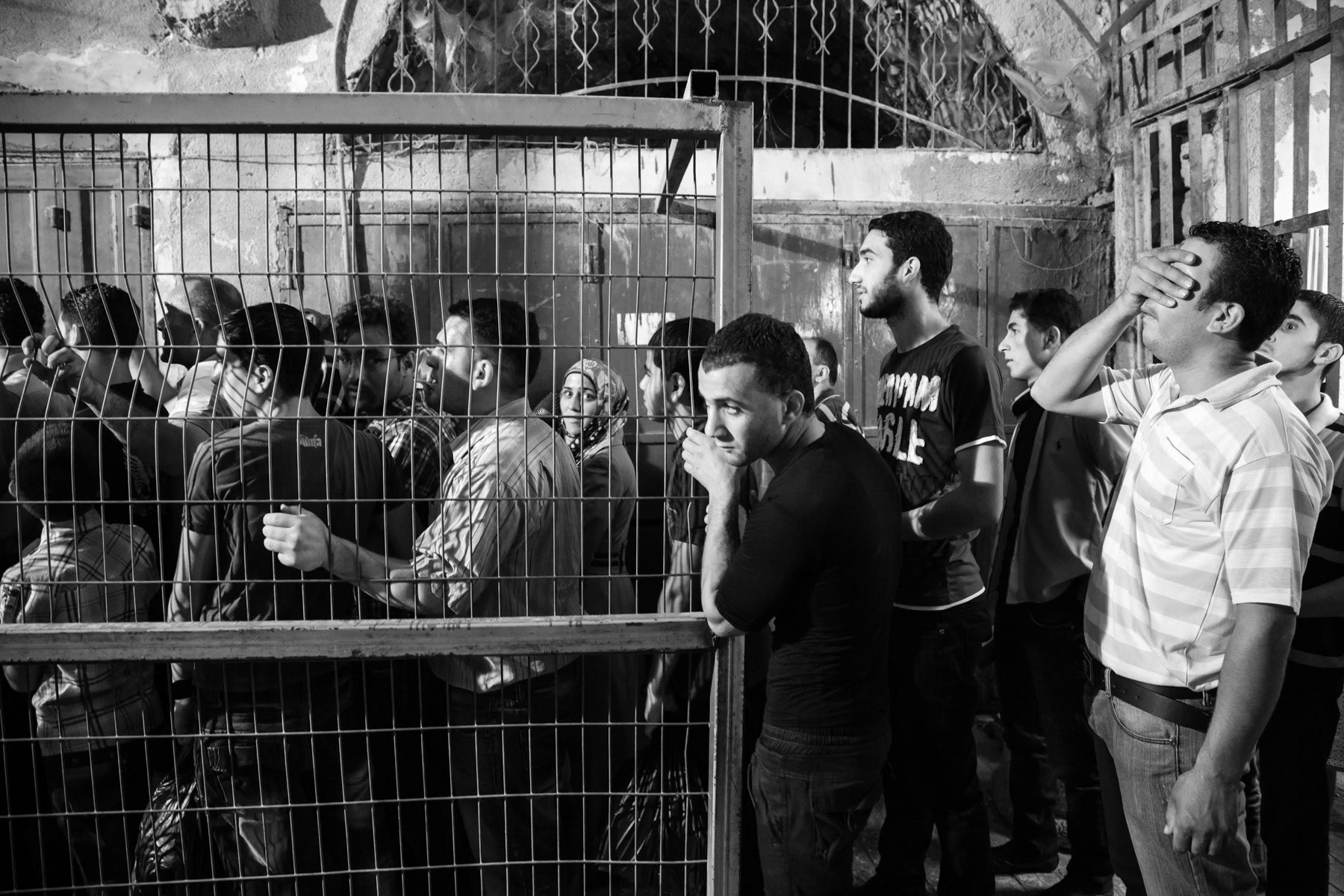 Waiting to pass a check-point in Hebron, Palestine, August 2013
