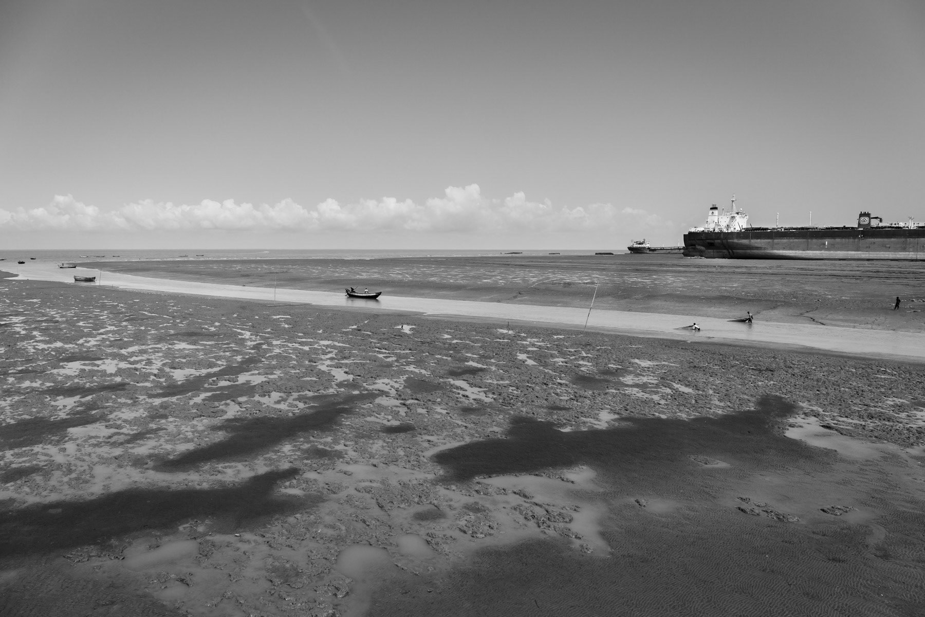 Sanwip Ghat, entry point for small fishing boats and final destination for large vessels. Ship-breaking yards north of Chittagong, Bangladesh, June 2015