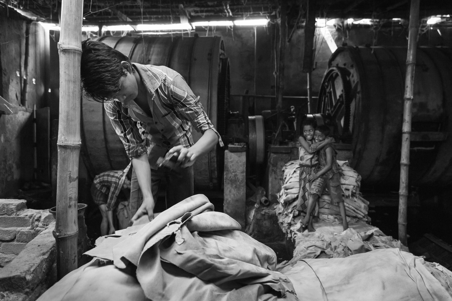 Inside a tannery, where workers are exposed to toxic agents used to process the animal skin into leather. Hazirabagh neighbourhood of Dhaka, Bangladesh, October 2014
