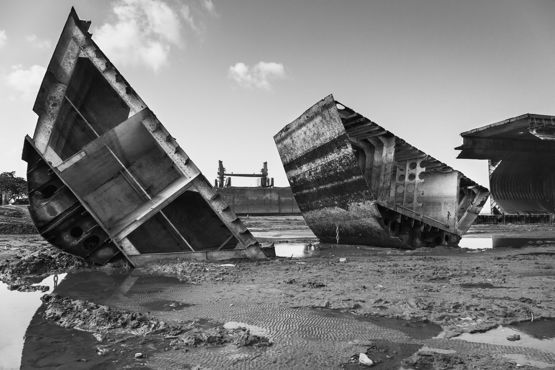 Cut-off ship parts waiting to be reduced to smaller pieces and recycled, Ship-Breaking yards in Sainbolt, Chittagong, Bangladesh, June 2015