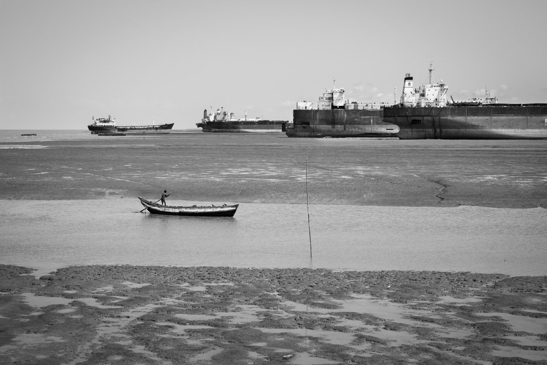 Fisherman returning during low tide, Bhatiary ship-breaking yards, Chittagong, June 2015