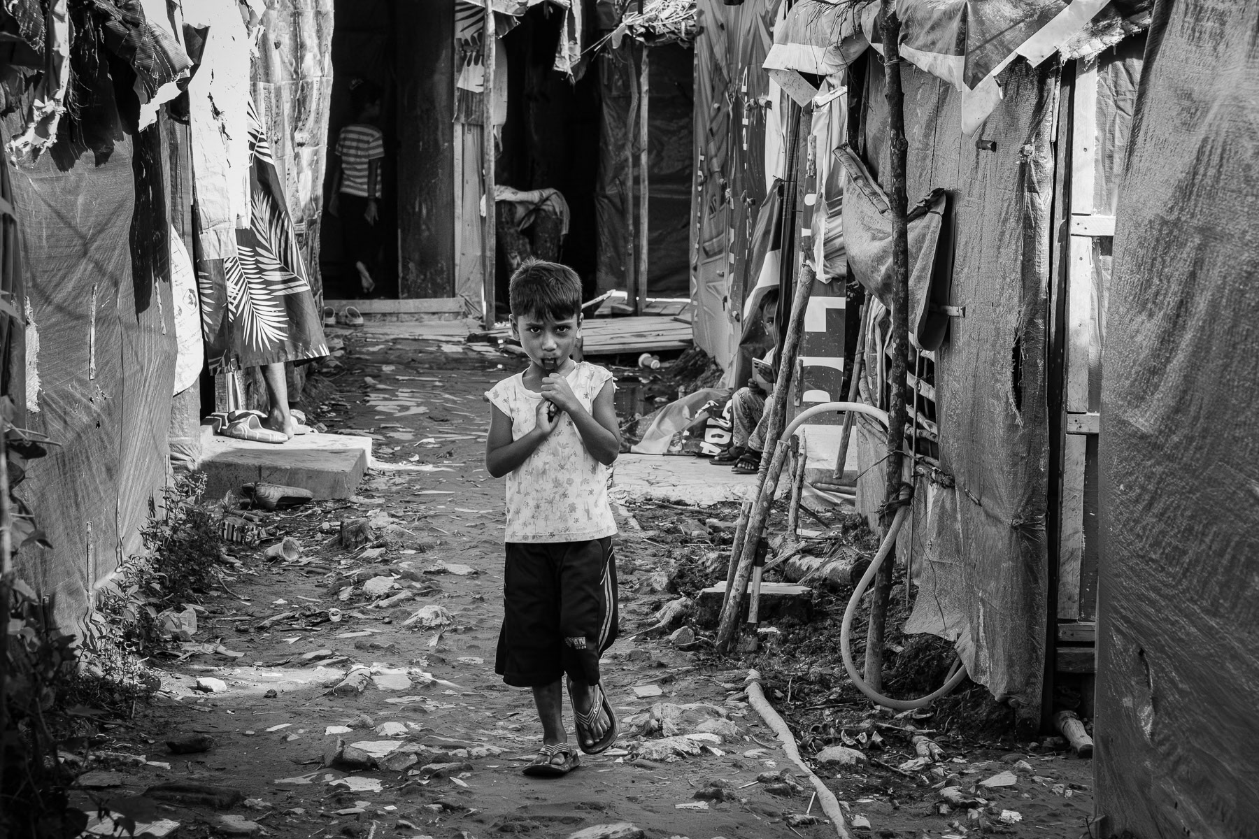 Months after a perilous boat journey, a Rohingya refugee finds a fragile home in a makeshift camp in Sumatra. Pekanbaru, Indonesia, May 2025