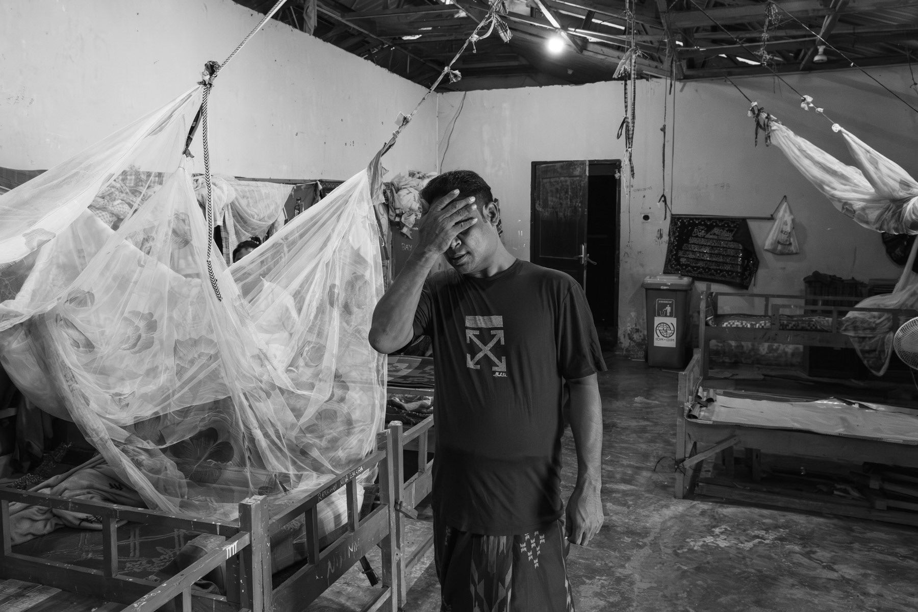 A Rohingya man in a shelter for boat people that arrived on the coast of Aceh between December 2022 and April 2023. Padang Tijie, Bandar Aceh, Indonesia, October 2023