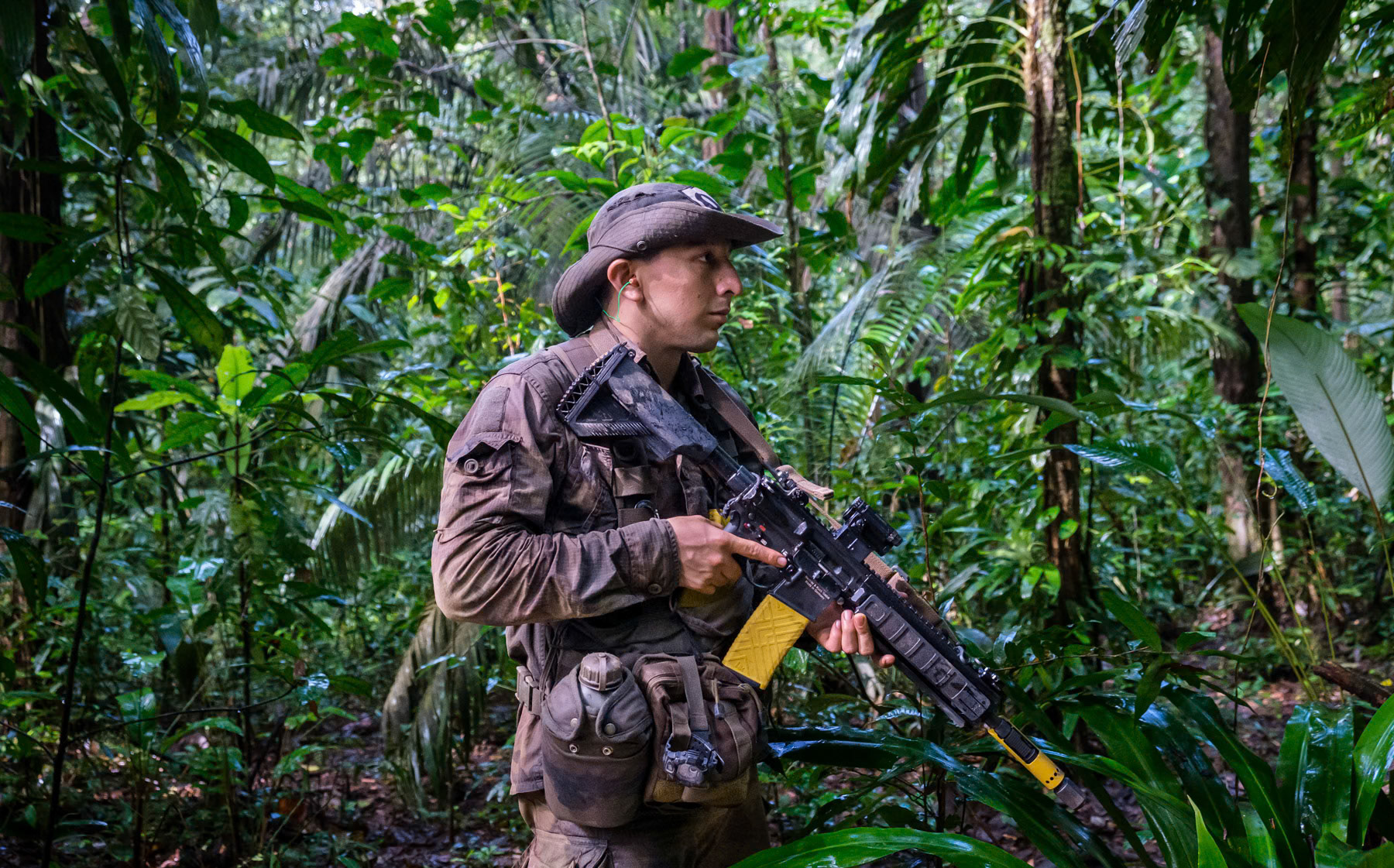 Regional military training camp in the Amazon organised for French and foreign allied military in jungle war fare. Many are Brazilian and Colombian and will be engaged in security operations across the Amazon against illigal gold mining and drug trafficking. Foreign Legion military camp, Regina, French Guyana, March 2022