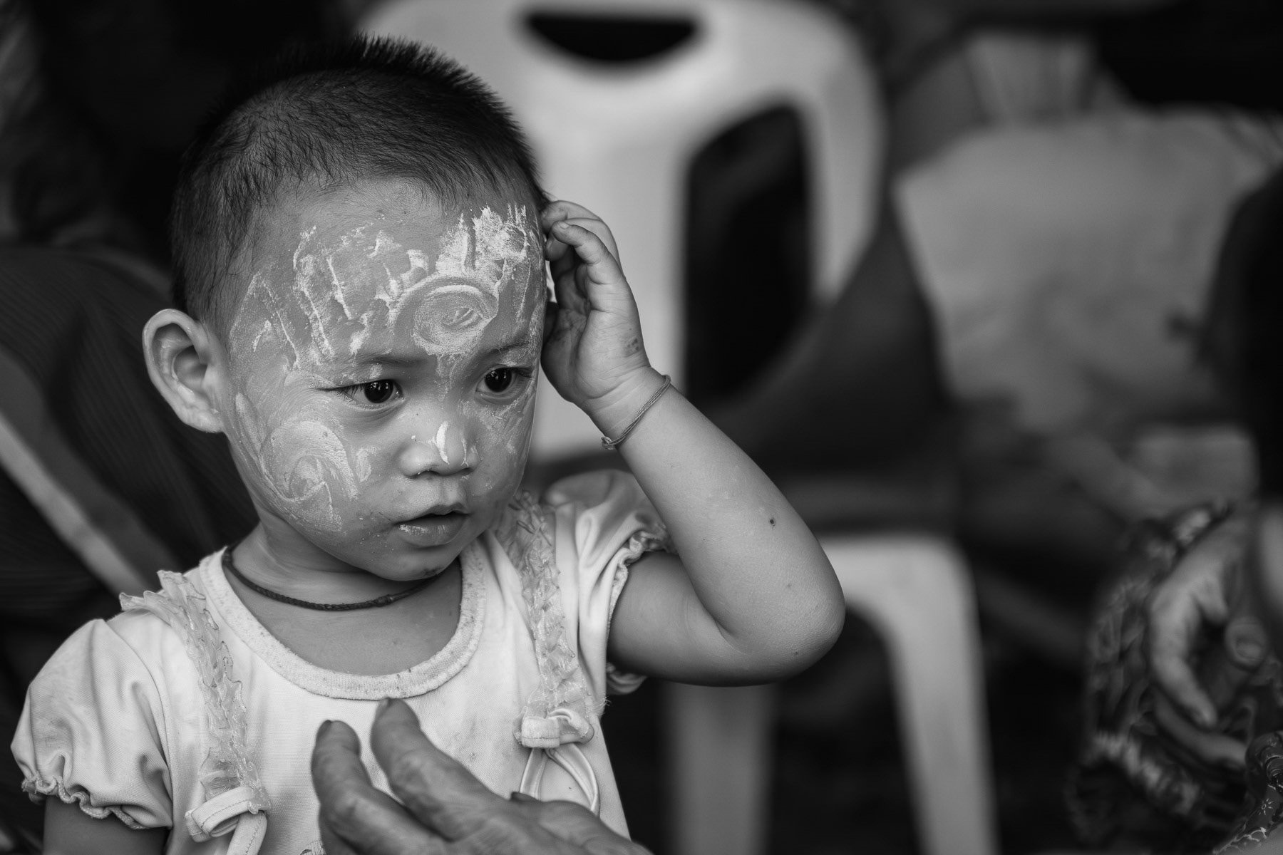 A child from the Karen ethnic minority in Myanmar. Kanele Htaw IDP camp for displaced persons. Kayin State, Myanmar, September 2024