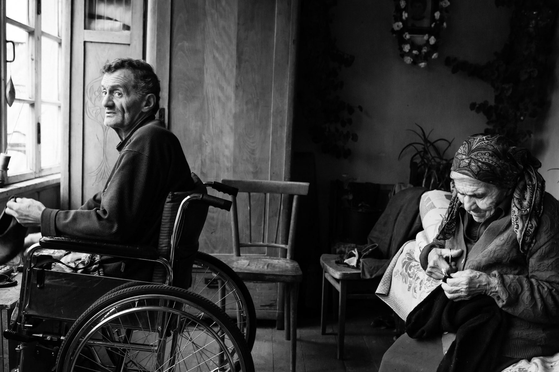 Land mine victim Narek and his mother at home in Samzor village, Nagorno-Karabakh, October 2013