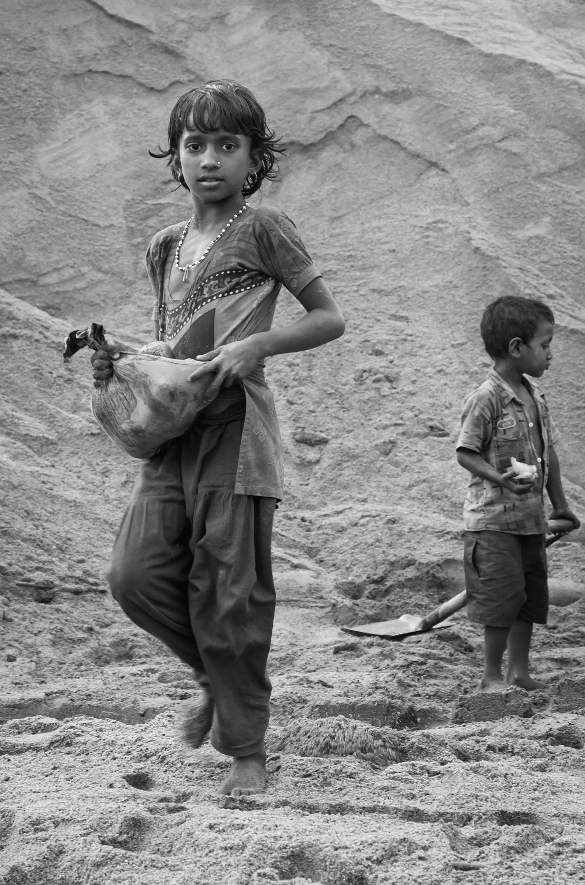 Children collecting stones in Goyain river bed, Jaflong in Bangladesh, December 2015