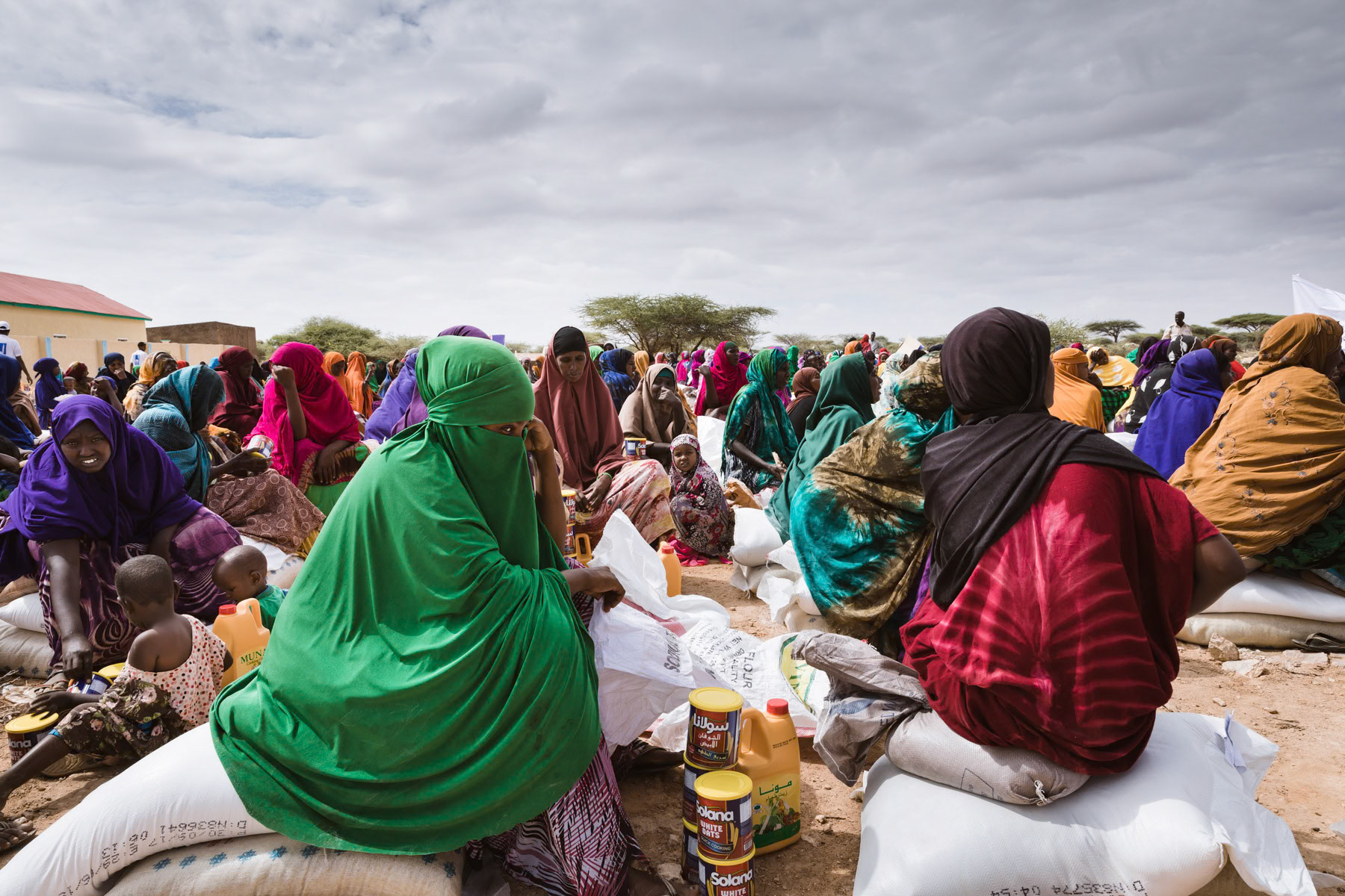 Climate refugees that lost all their livestock to the drought, waiting to get their 2 weekly food distribution. Wadamago IDP camp, Aynabo district of Saraar region in Somaliland, October 2017