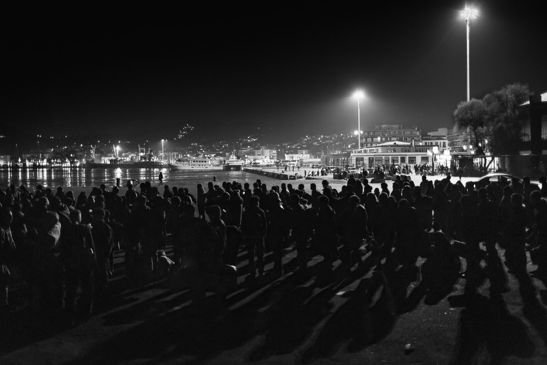 Refugges waiting to embark to Pireaus, port of Mythilini, Greece, November 2015