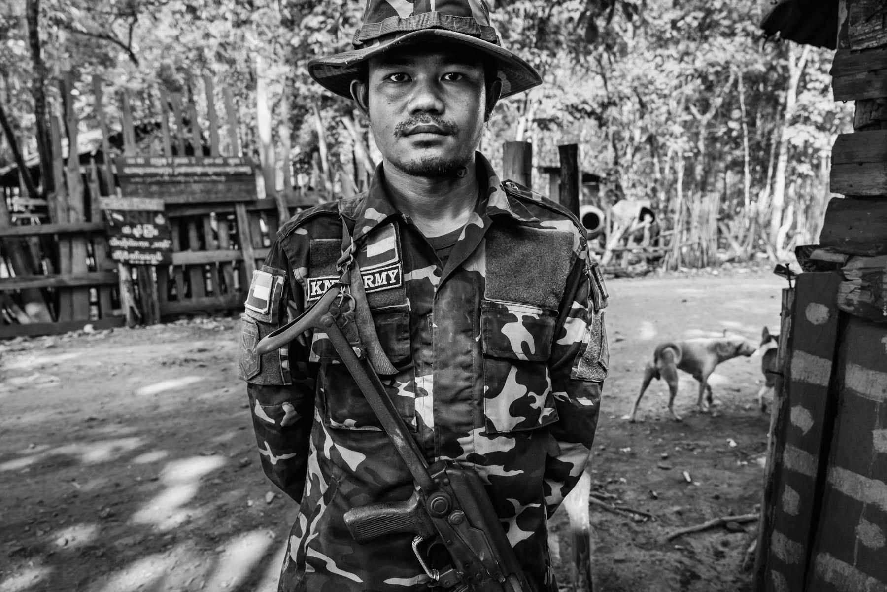 Member of the Karen National Liberation Army (KNLA), the armed resistance to the military dictatorship in an outpost in the forest near Kanele in Kayin State, Myanmar, May 2024