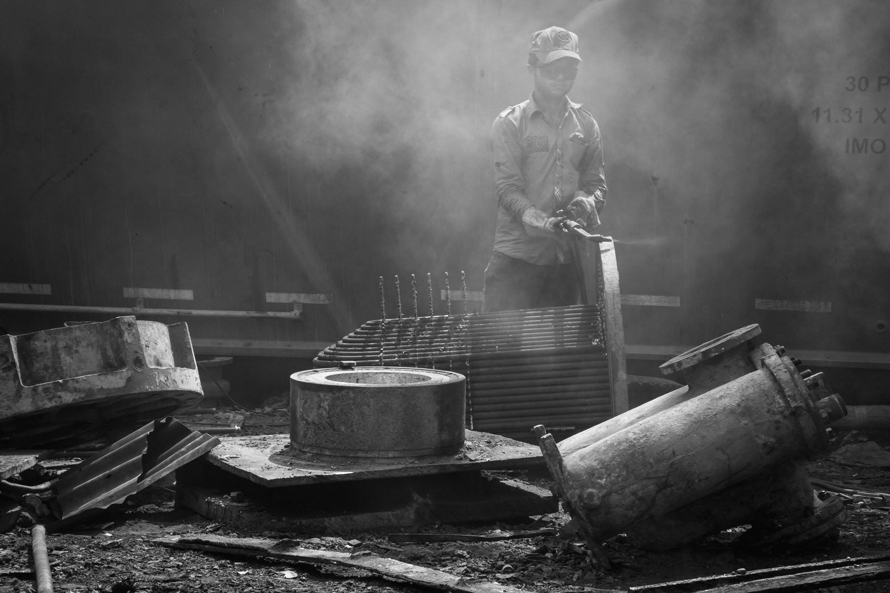 Cutting ship segments to smaller and transportable pieces, Bhatiary ship breaking yards, Bangladesh, October 2014