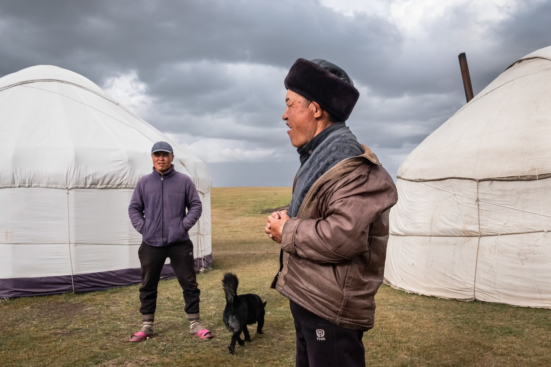 Livestock owners at their high altitude summer retreat where they find pastures for their livestock. Livestock is the main subsistance in Kyrgyzstan. Climate change, droughts and soil degradation are affecting their livelihood at unprecedented levels in the past years. Ak Tal, Naryn region, Kyrgyzstan, August 2021