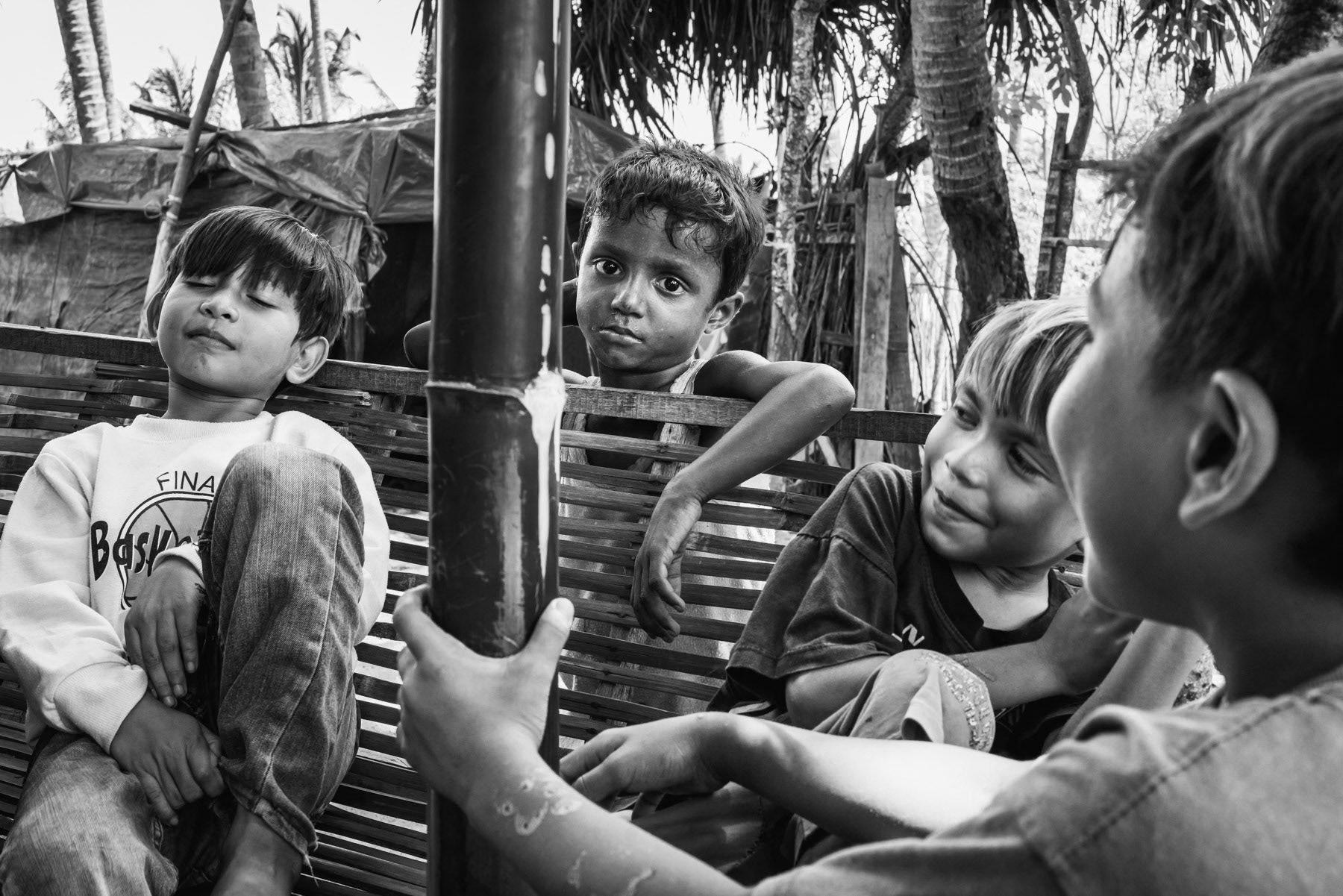 Stranded Rohingya children from Burma that have arrived recently on the coast of Aceh. They have been sheltered on the beach under harsh conditions ever since setting foot on this beach 6 months ago. Kulee Pidie in Aceh on the island of Sumatra in Indonesia, May 2024
