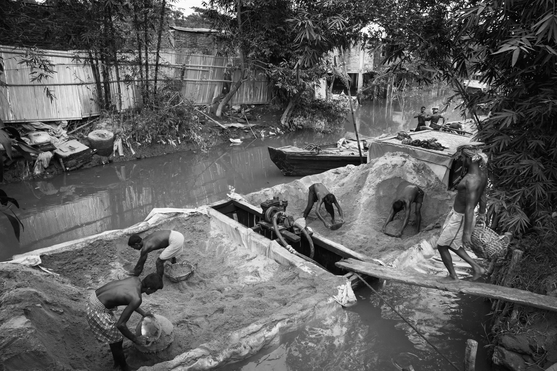 Transportation barge being unloaded, suburbs of Chittagong, Bangladesh, October 2014