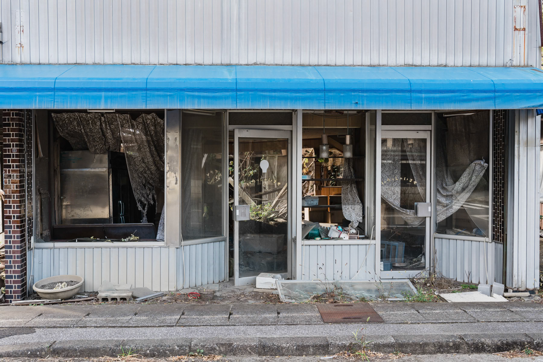 Abandoned shops in the town of Futaba beside the Fukushima nuclear power plant. The place has been off limit to live there since the nuclear disaster in 2011. Futaba, Fukushima, Japan, October 2023