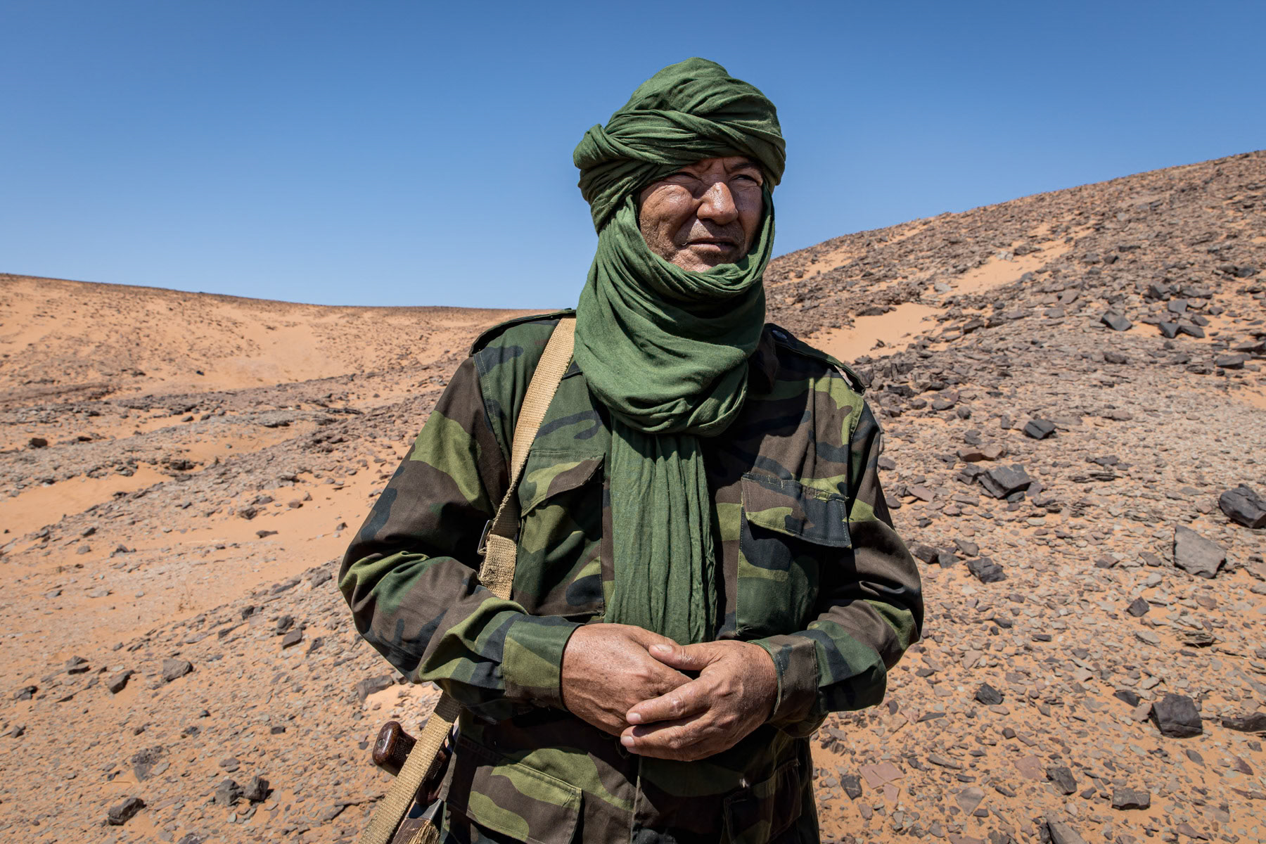 Saharawi military officer at an outlook point on the frontline. Second military region of the Sahrawi Arab Democratic Republic, October 2021