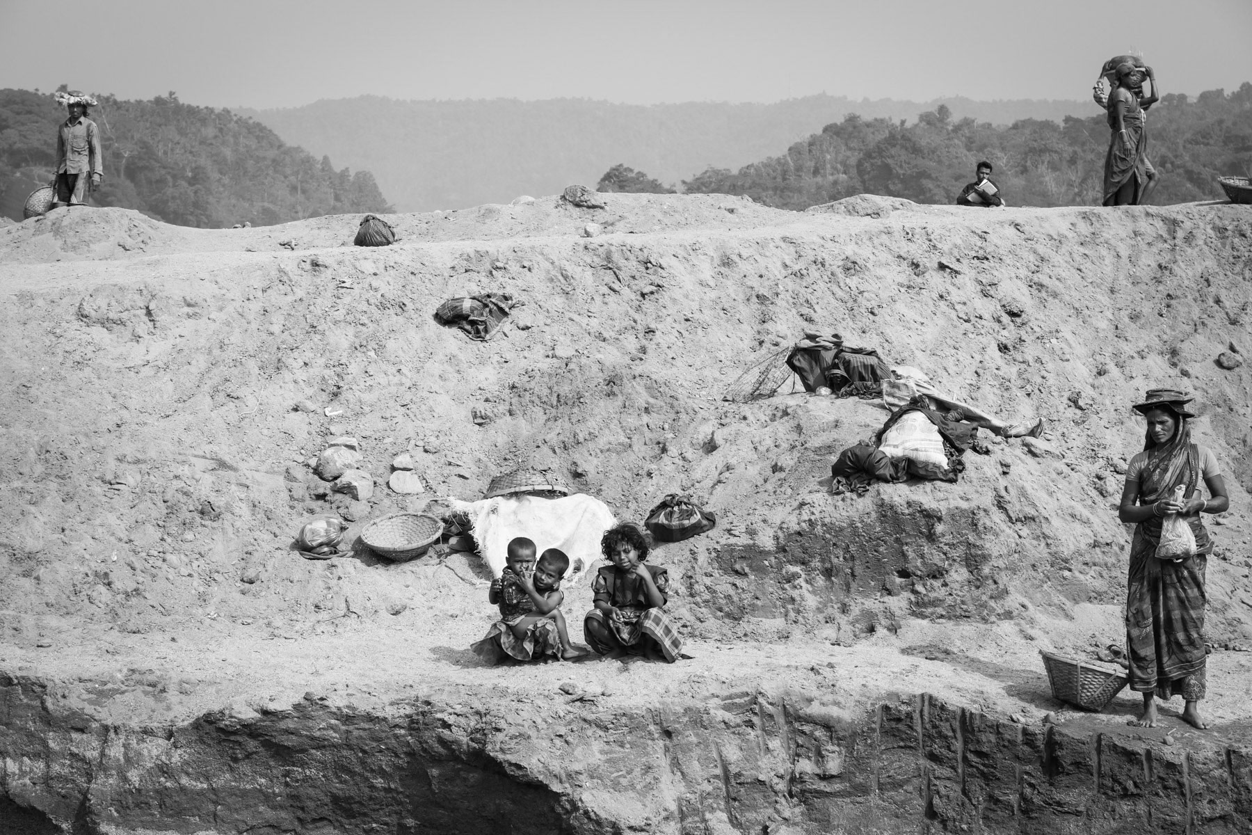 Entire families move and work at the stone extraction sites during the dry season, Jaflong, Bangladesh, December 2015