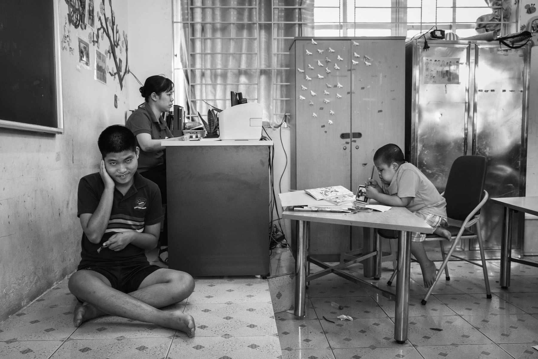 Agent Orange victims at the Friendship Village in Hanoi. Agent Orange is a chemical defoilant rich in dioxin that was massively used by the American Army in clearance operations during the Vietnam War. Although its use was stopped in 1971, almost 50 years later desendants of affected victims are still born with mental and/or physical problems due to the toxicity of the dioxin passed on through generations. Hanoi, Vietnam, June 2018
